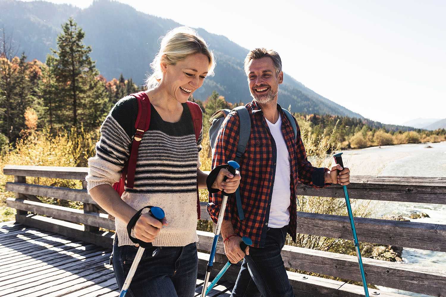 Man and Woman Hiking in the Mountains 