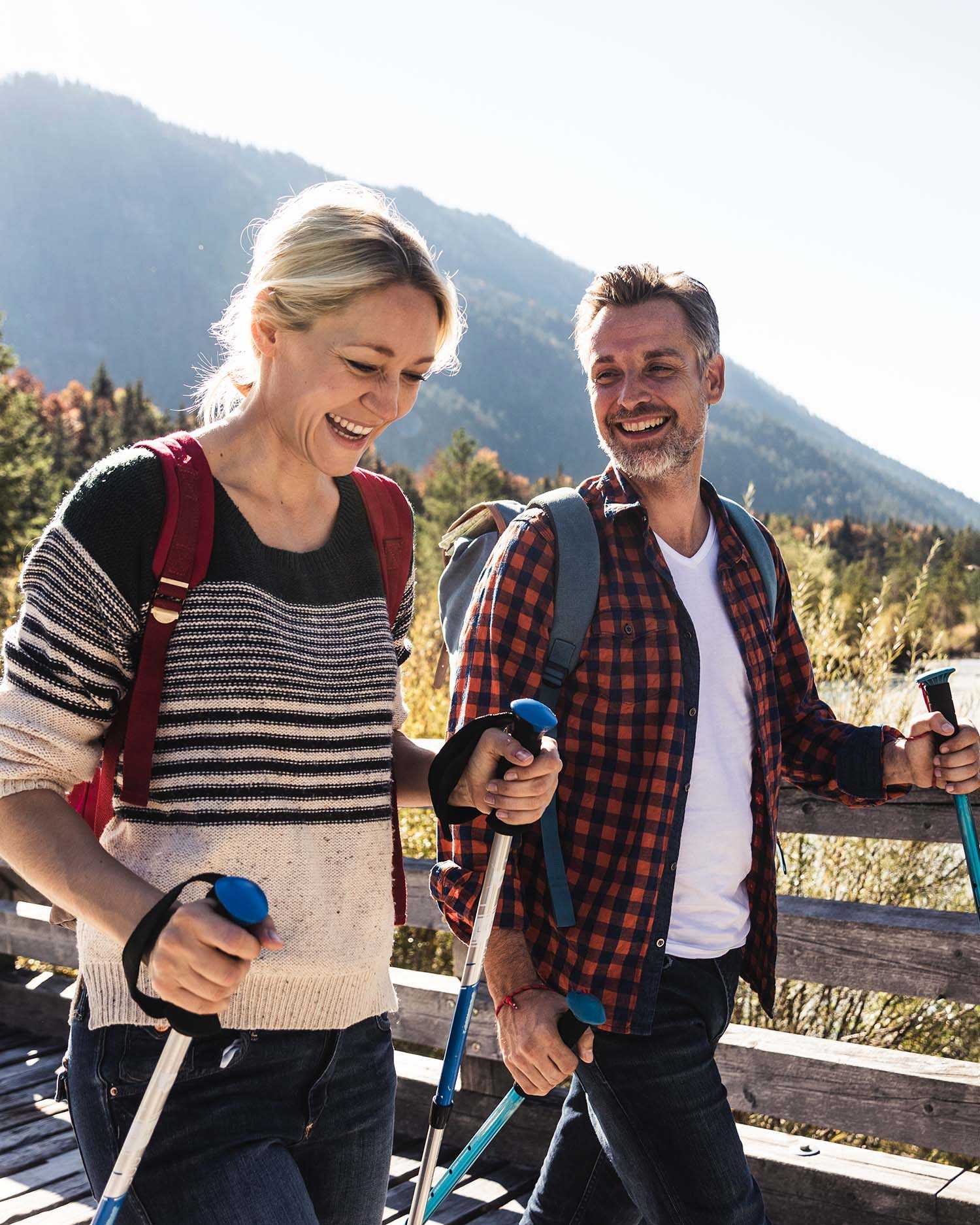 Man and Woman Hiking in the Mountains 
