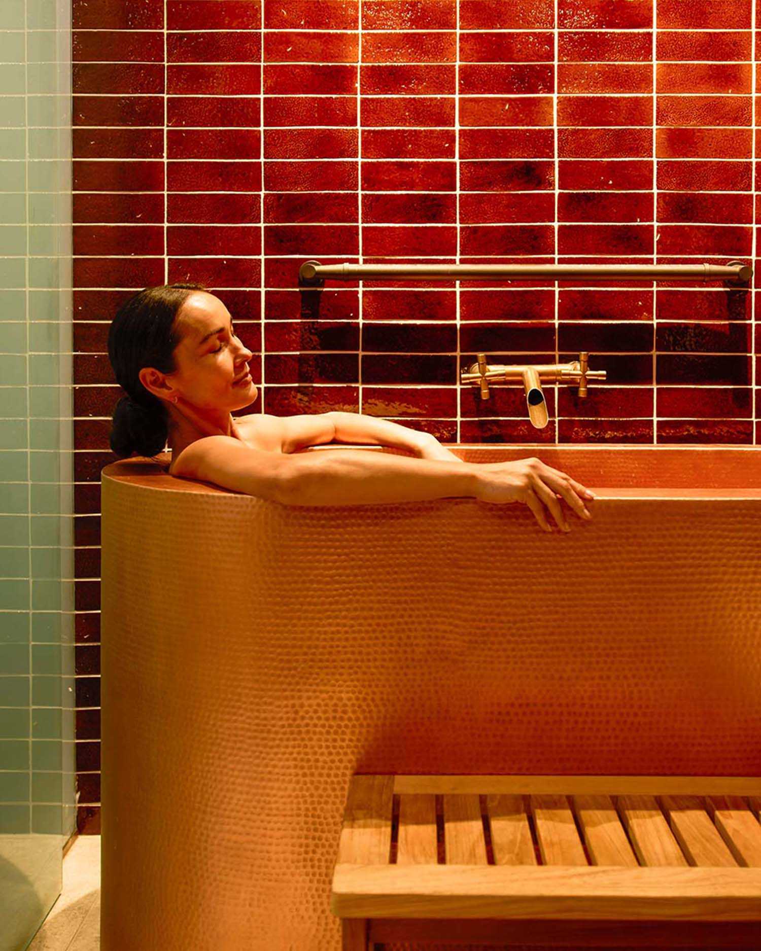Woman Relaxing in a Tub 