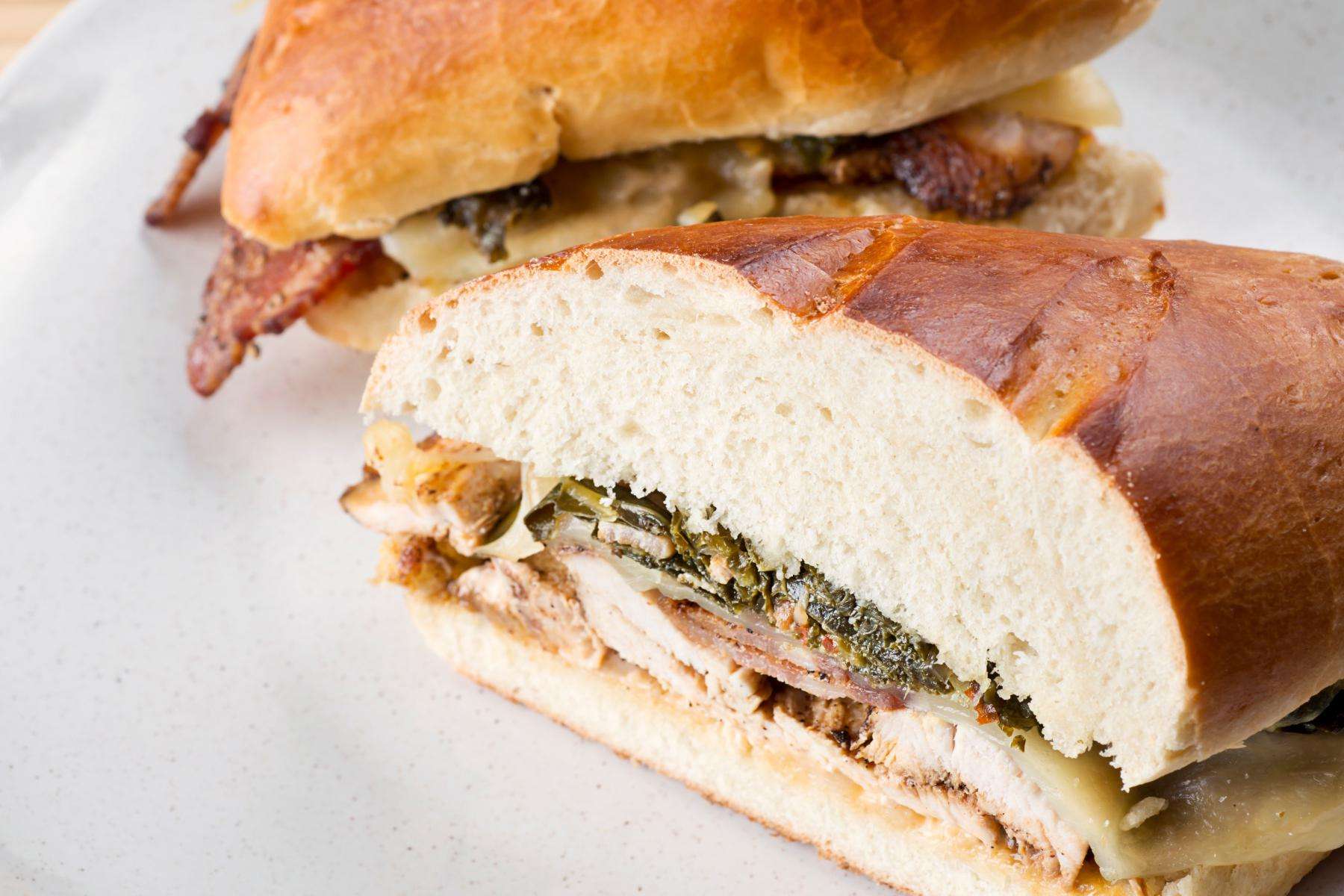 Close-up of toasted turkey muffuletta sandwich.