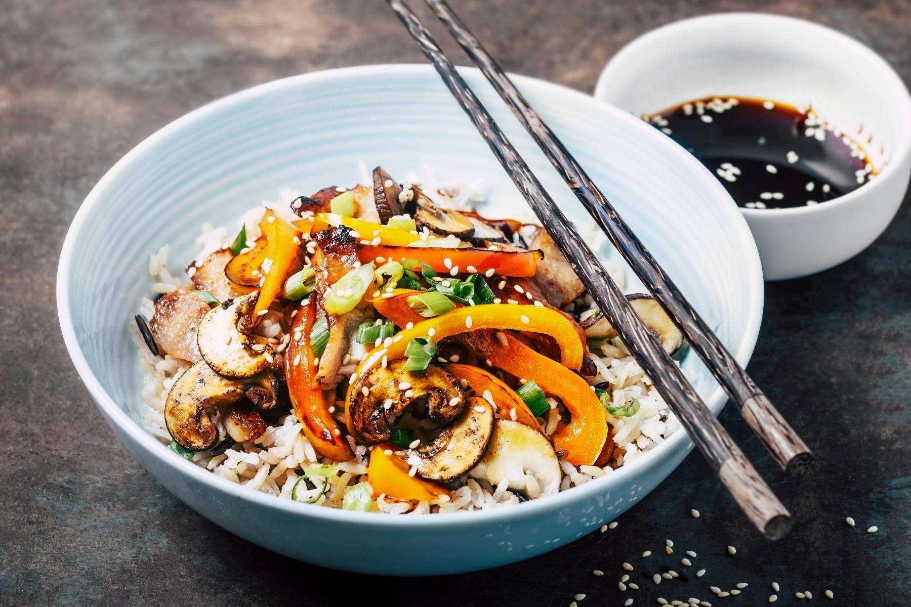 Bowl of stir fried vegetable and rice.