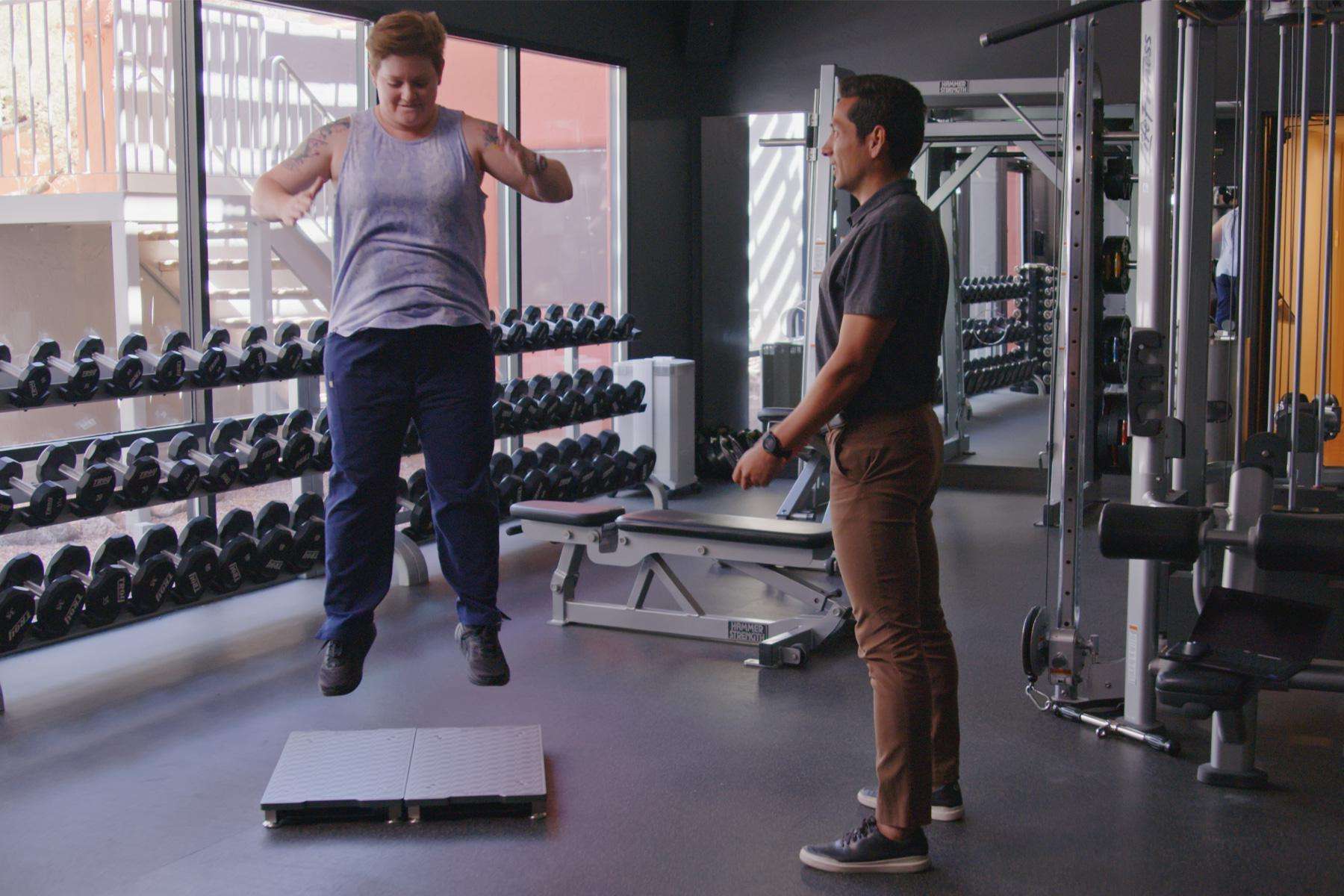 Image of Carlos Jimenez, DPT, SCS, CSCS, Director of Sports Medicine at Canyon Ranch Tucson, performing a jump training consultation at Canyon Ranch.