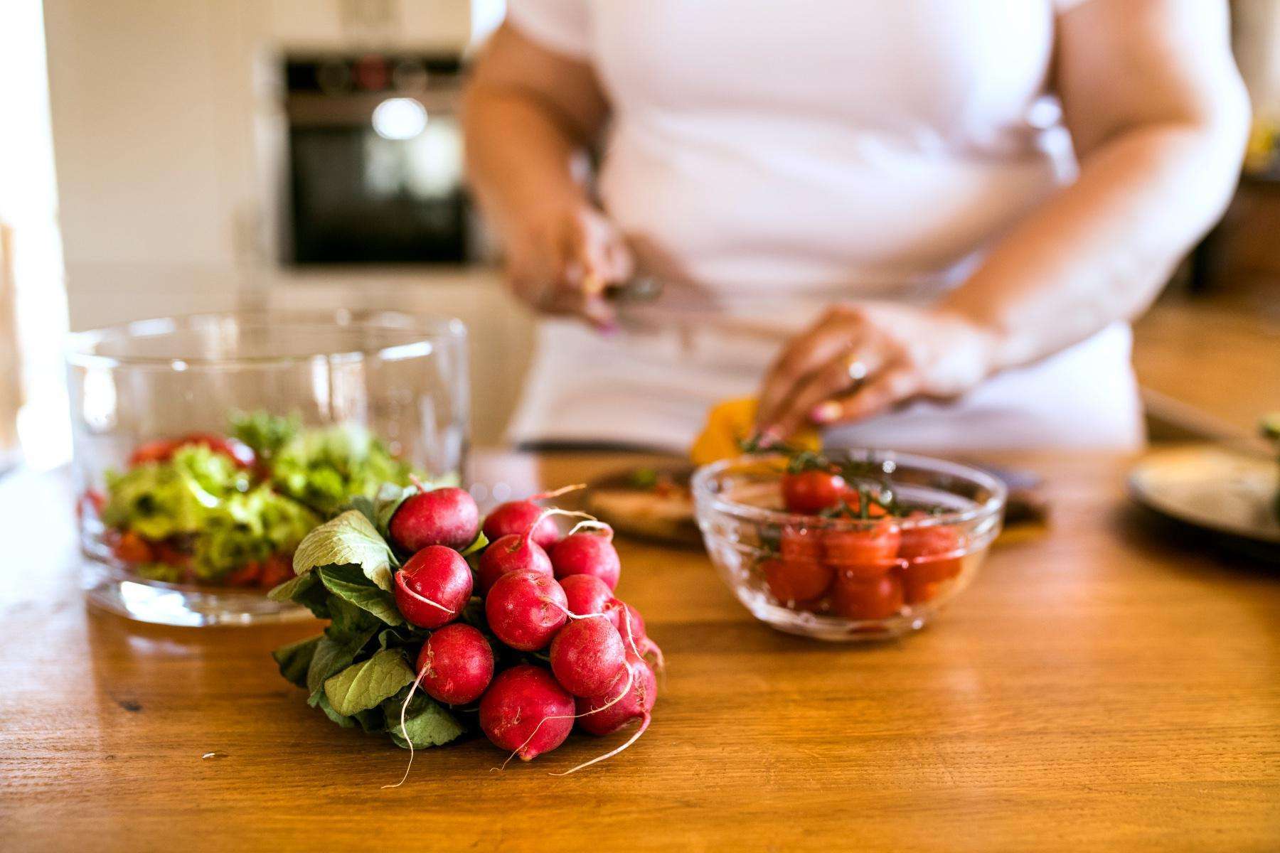 woman chopping vegetables