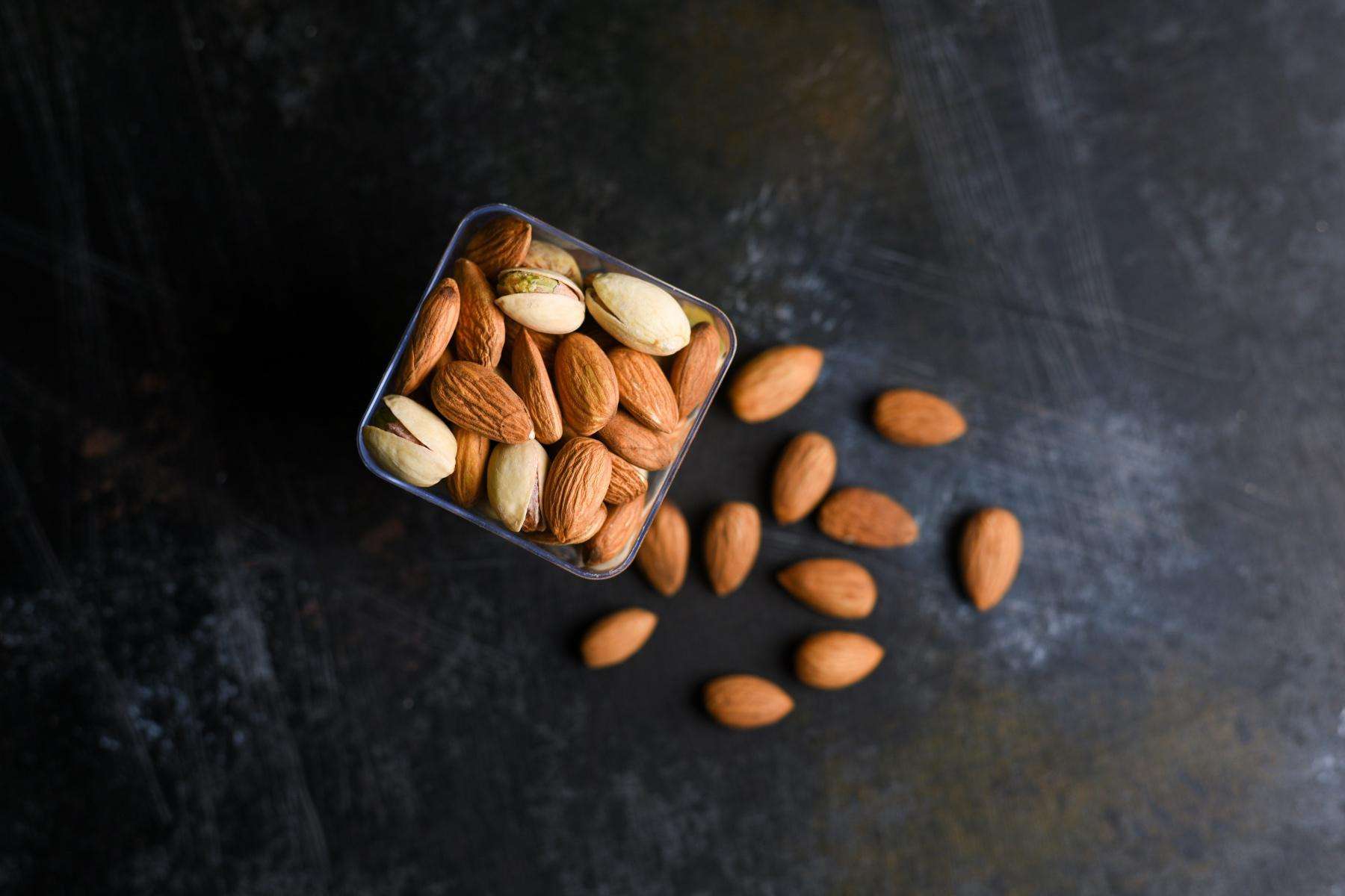 overhead image of a jar of almonds
