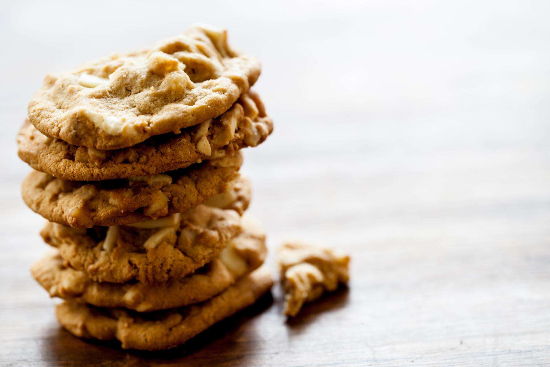 Stack of white chocolate macadamia cookies.