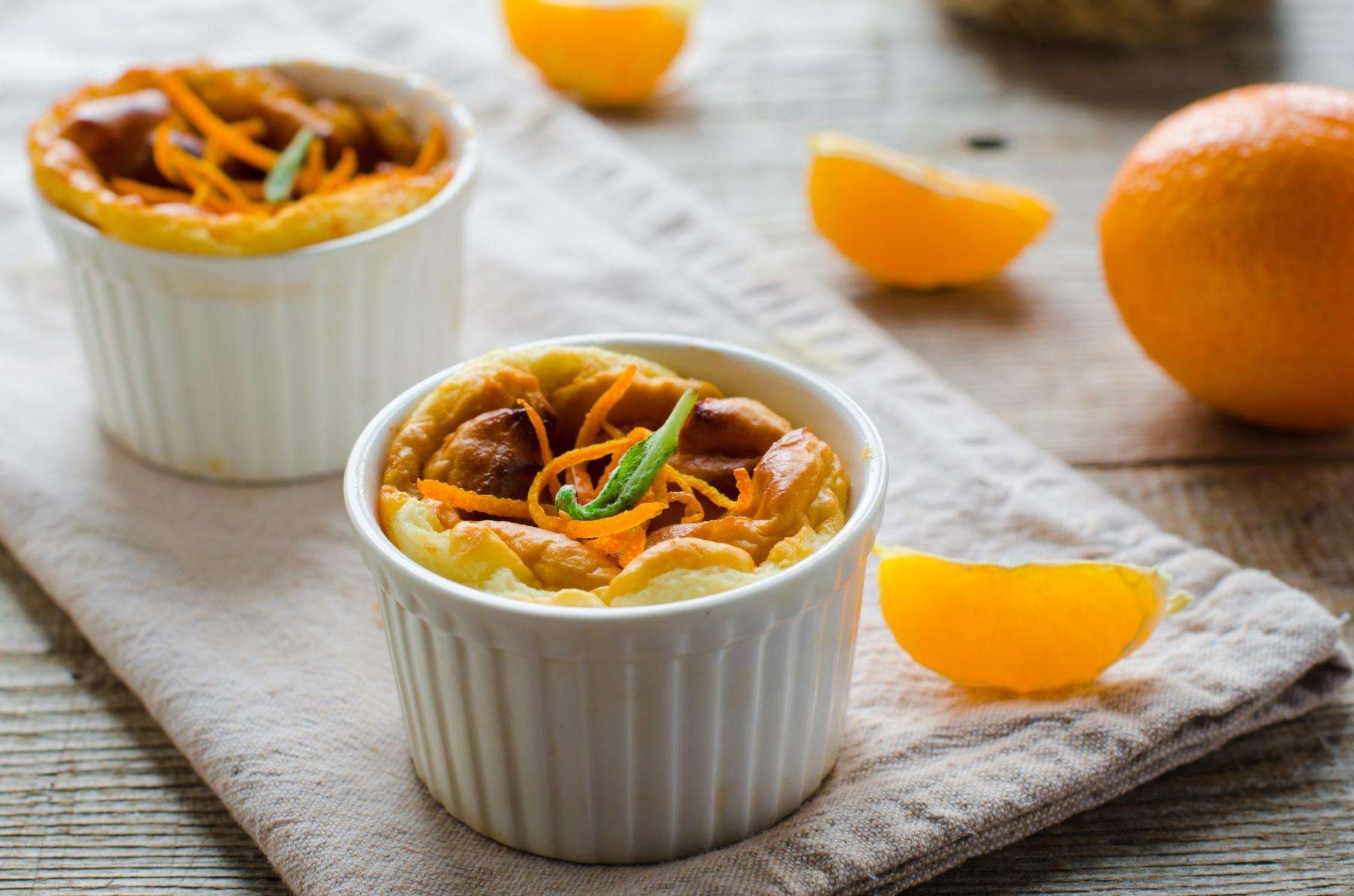 Two ramekins of orange souffle.