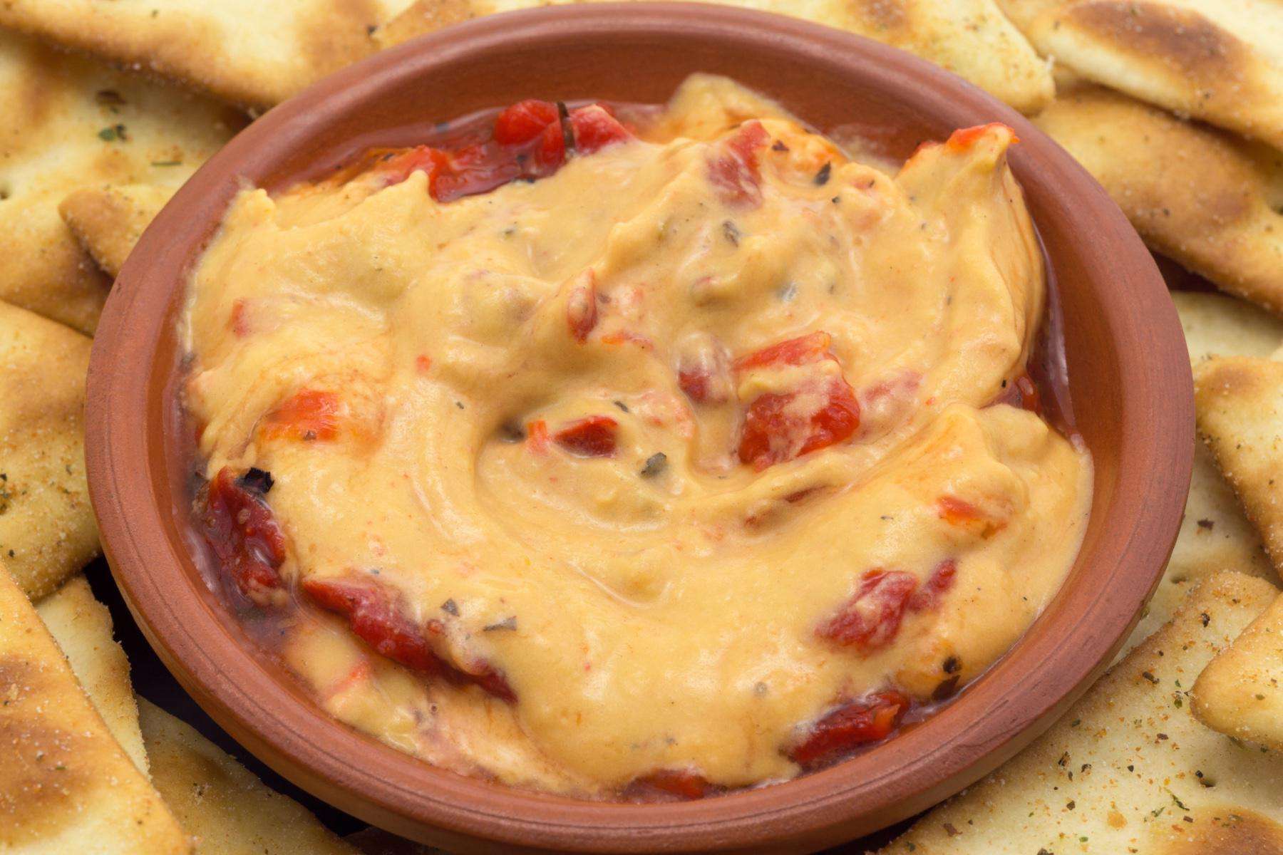 Bowl of red pepper hummus.