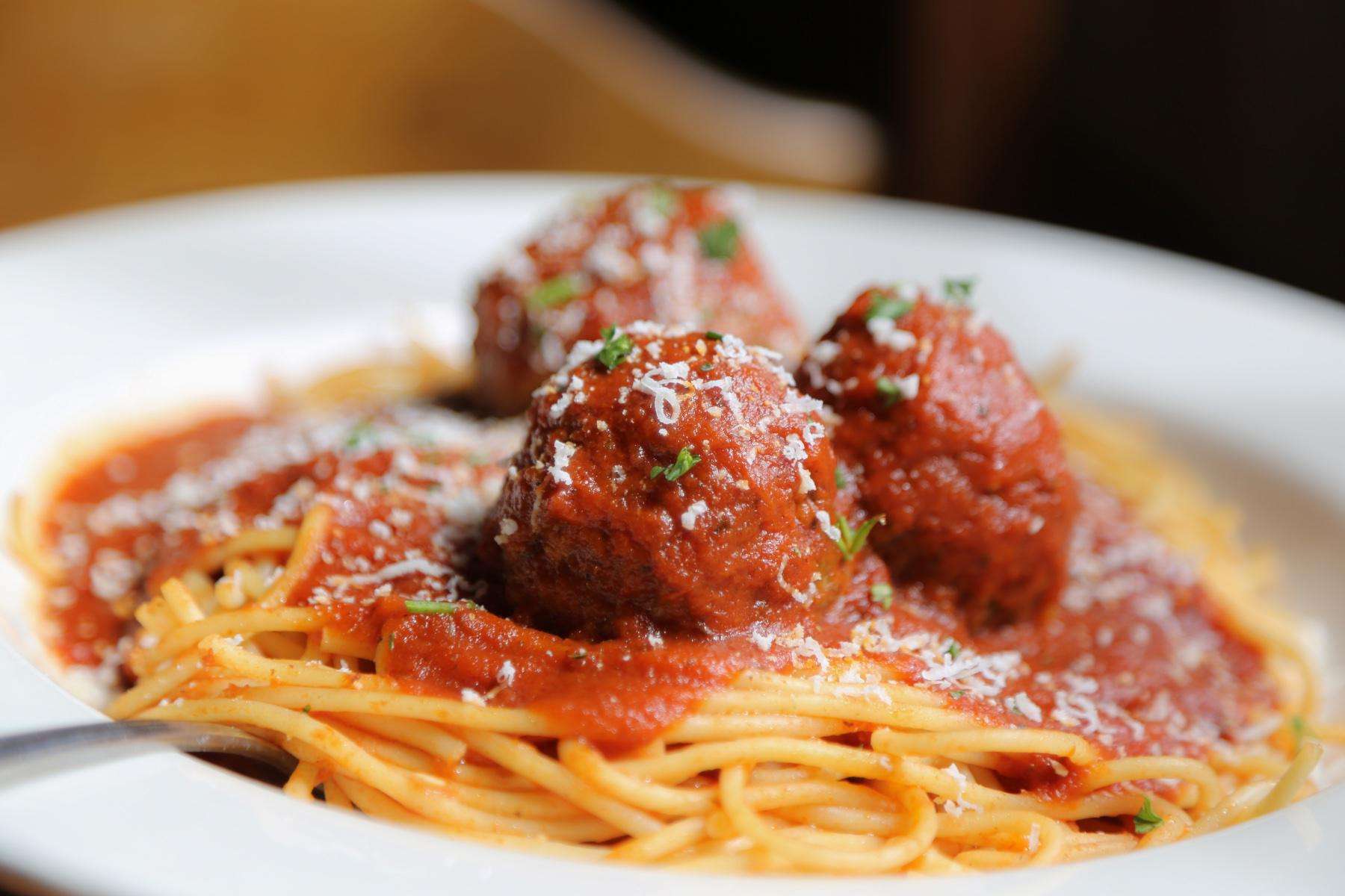 Close-up of a plate of spaghetti and meatballs.