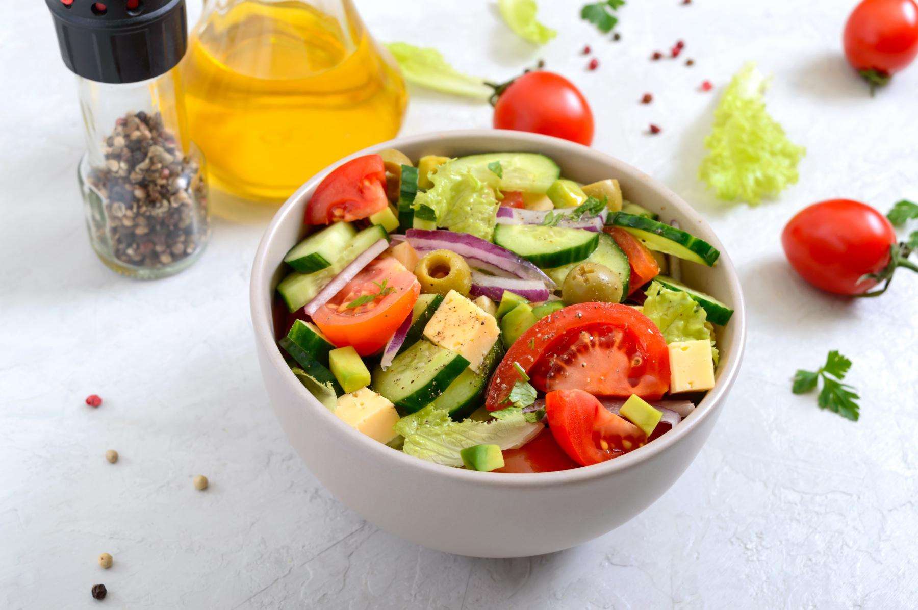 Overhead view of a bowl of mediterranean chopped salad.