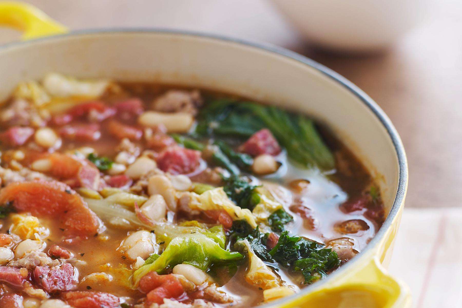 Close-up of a bowl filled with Italian wedding soup.