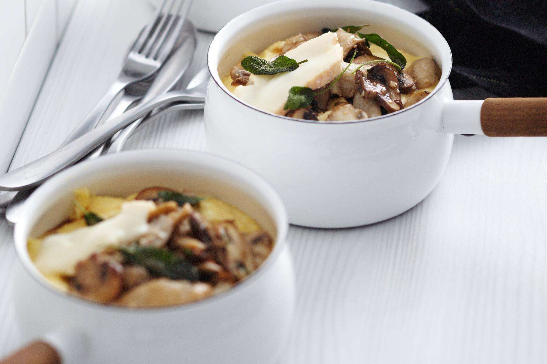 Two ramekins with porcini mushrooms.