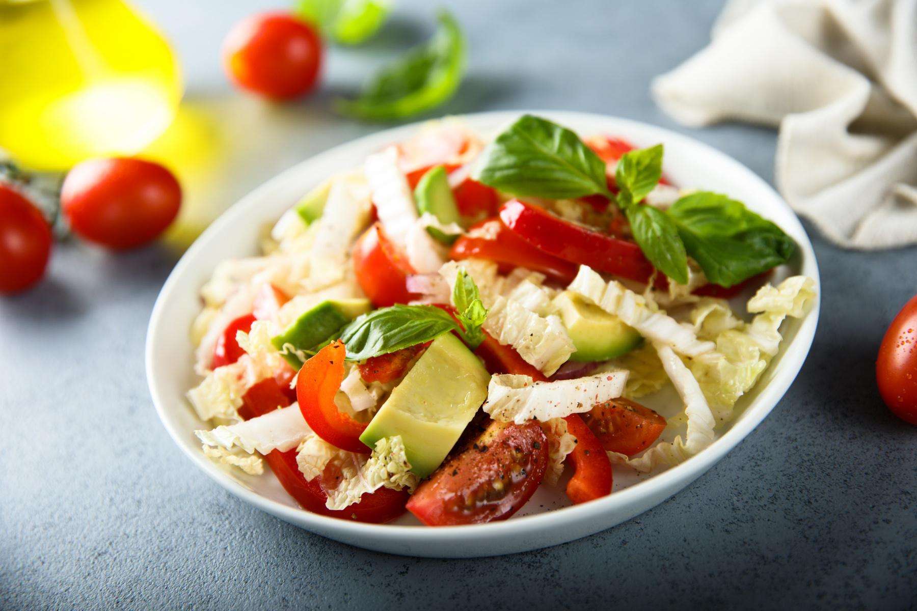 A bowl of southwest roasted pepper and avocado salad.