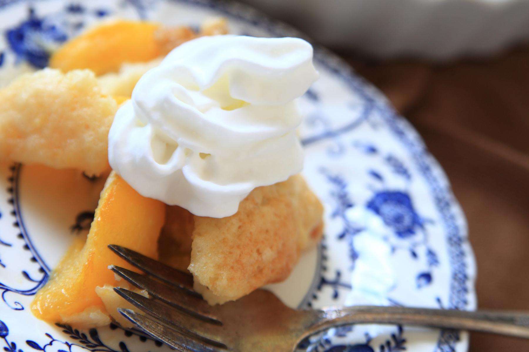 Close-up of a slice of peach cobbler.