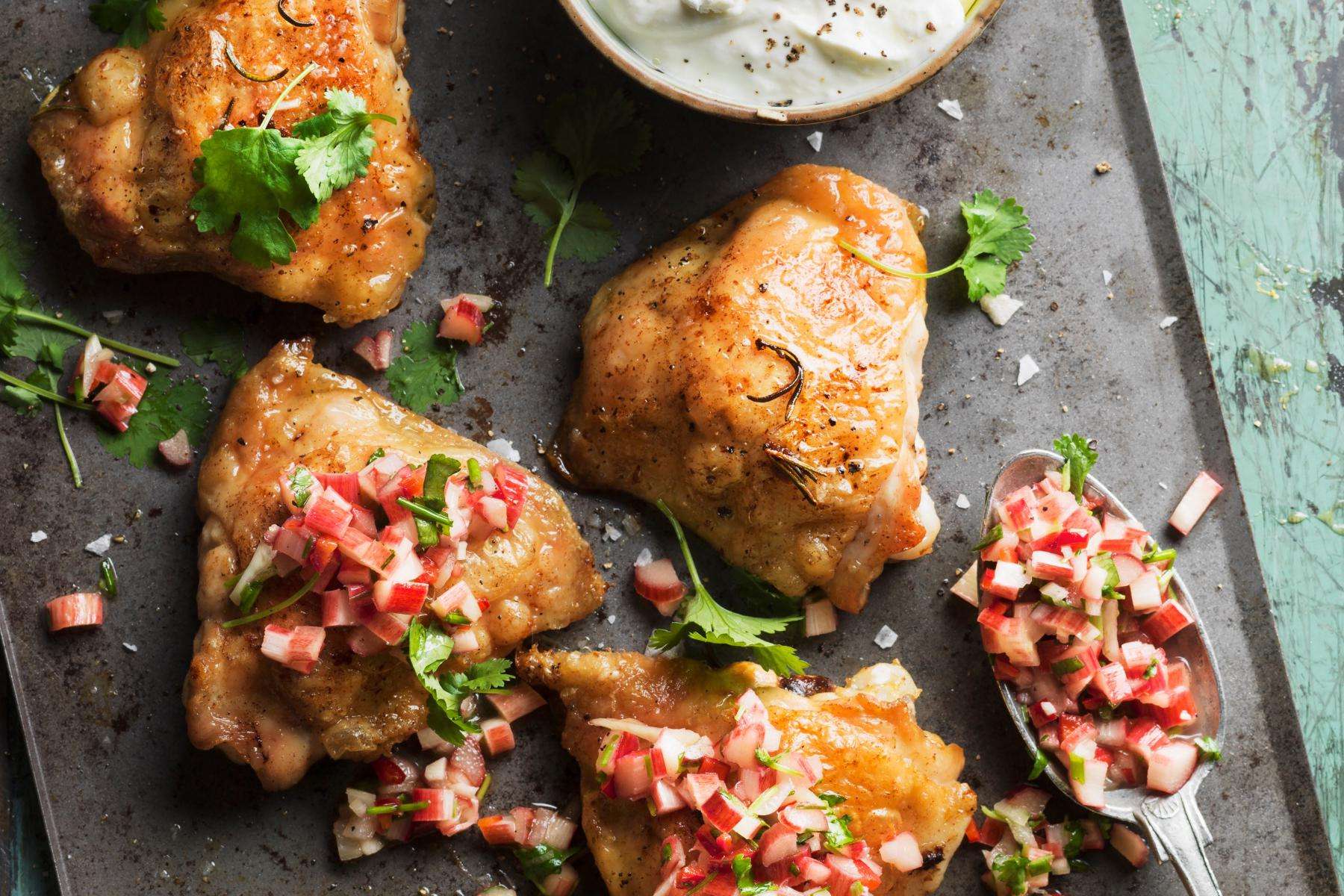 A plate of orange peel chicken with stone fruit salsa.