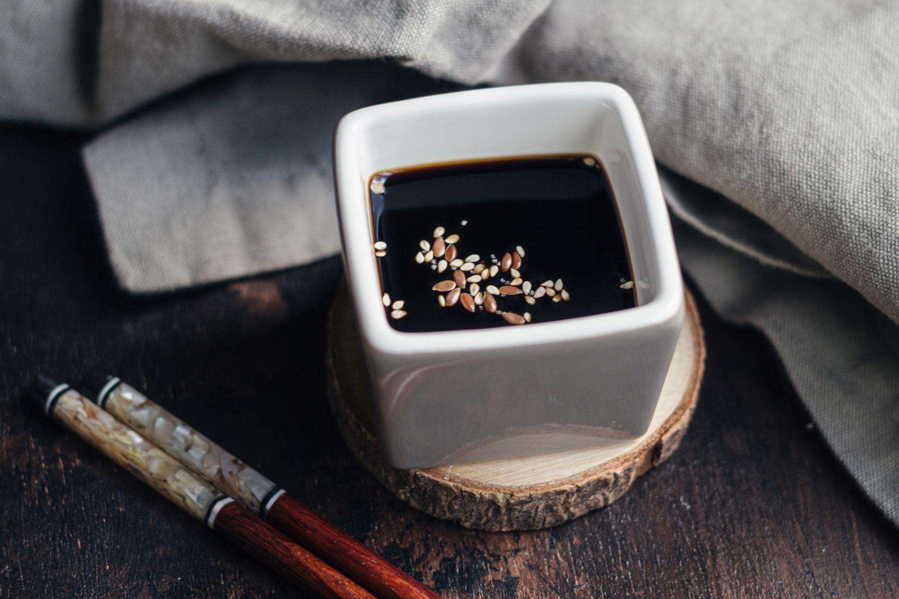 Soy sauce in dish.