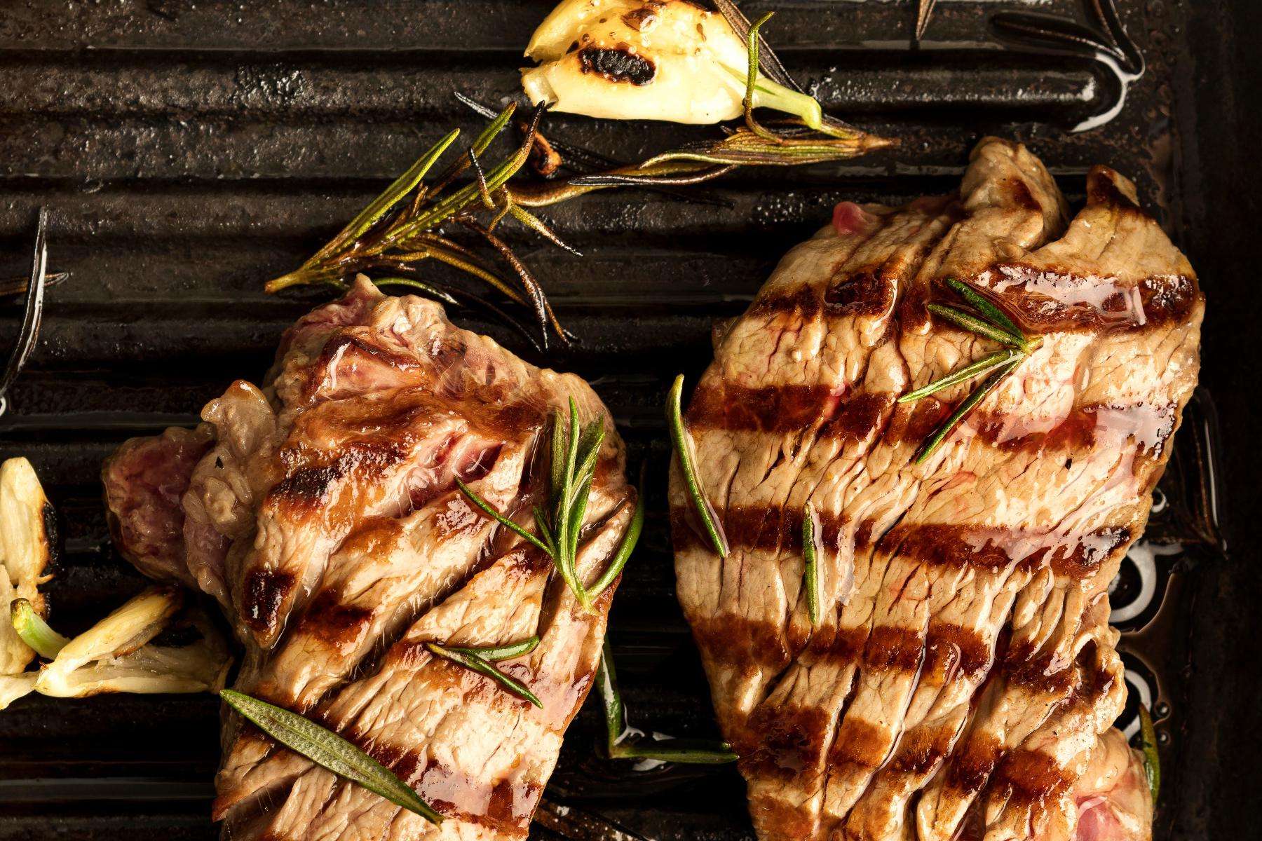 Lamb loin with herbs on top.