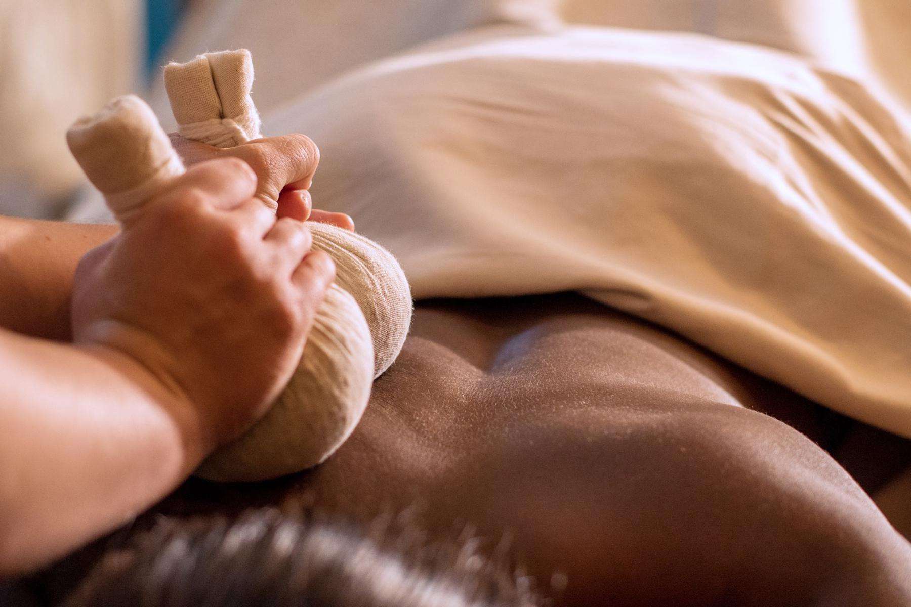 A woman receiving a massage.
