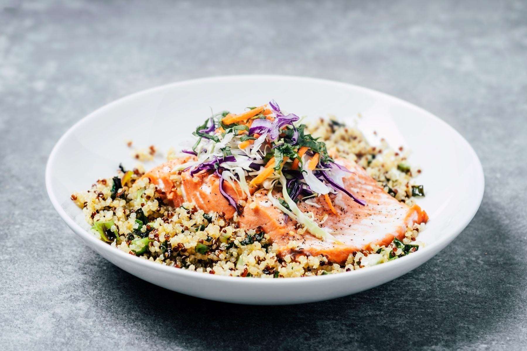 A plate of quinoa and fish.