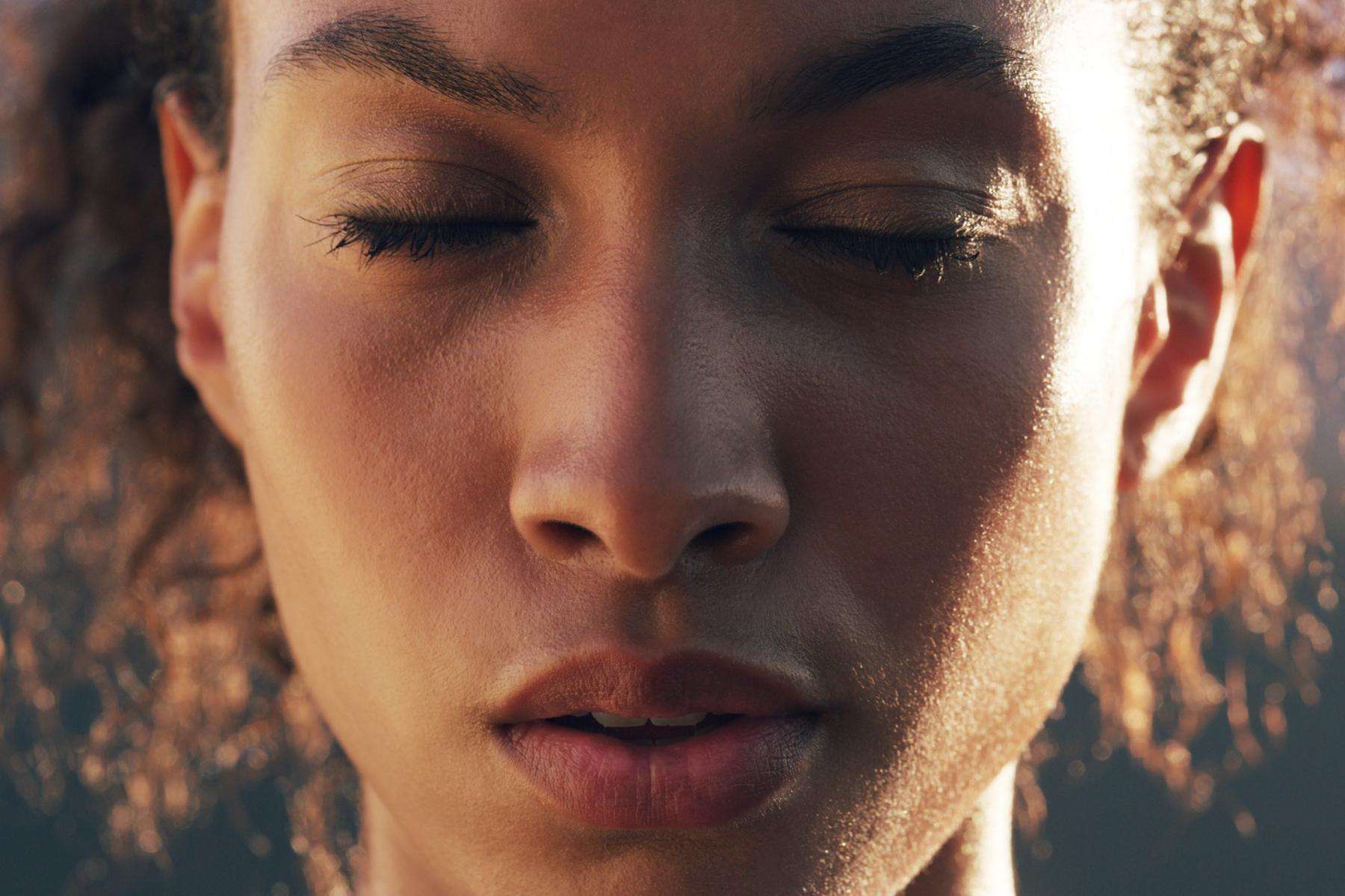 A close up of a young woman's face