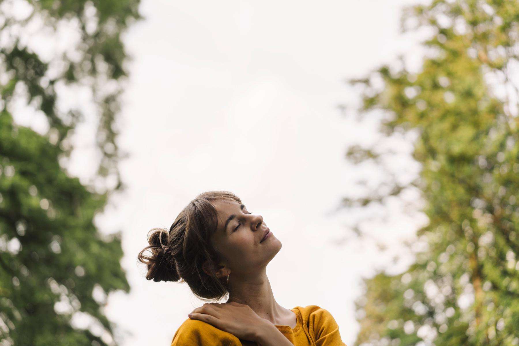 Woman looking up at the sky.