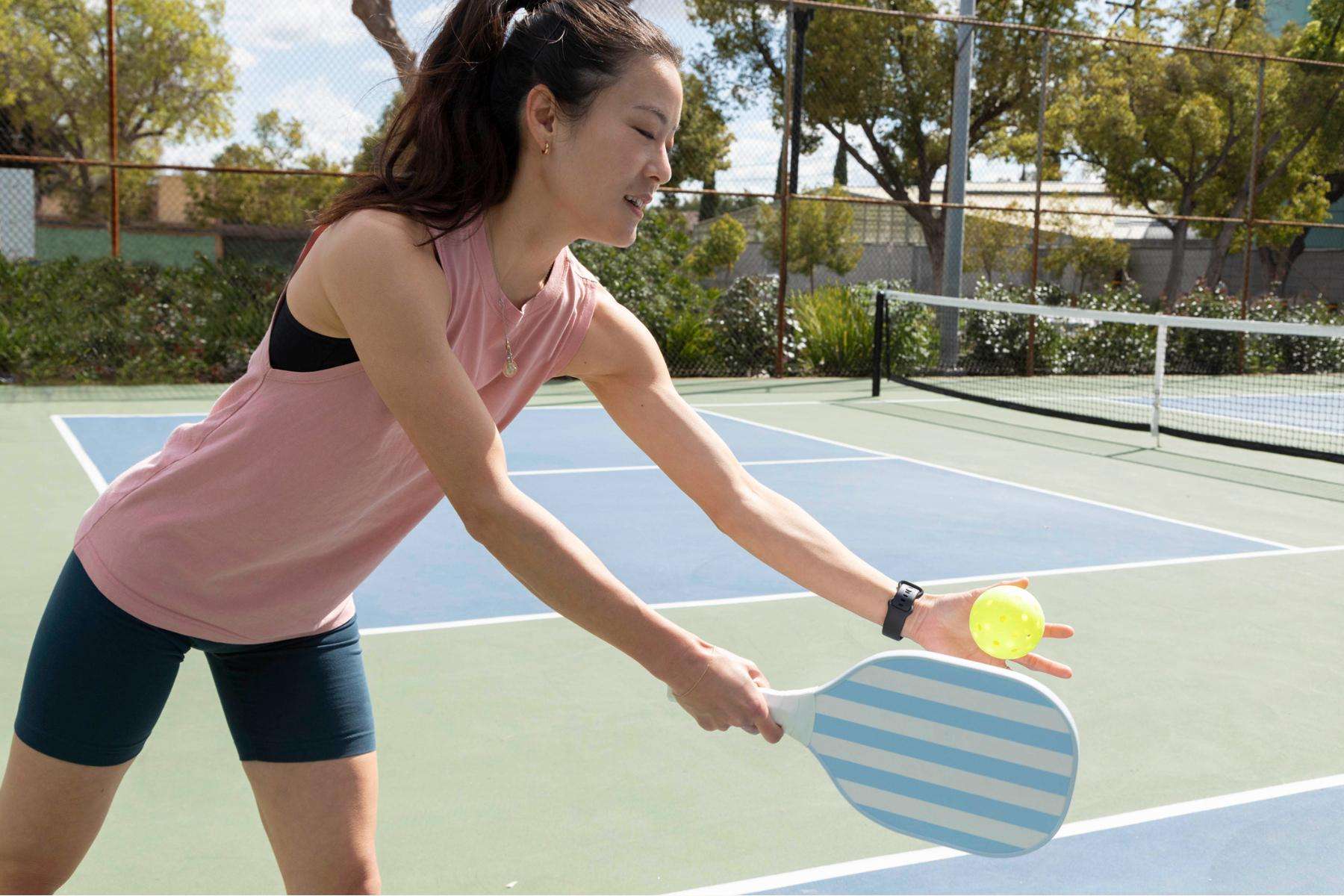 a group playing pickleball on the outdoor courts at Canyon Ranch health spa resort