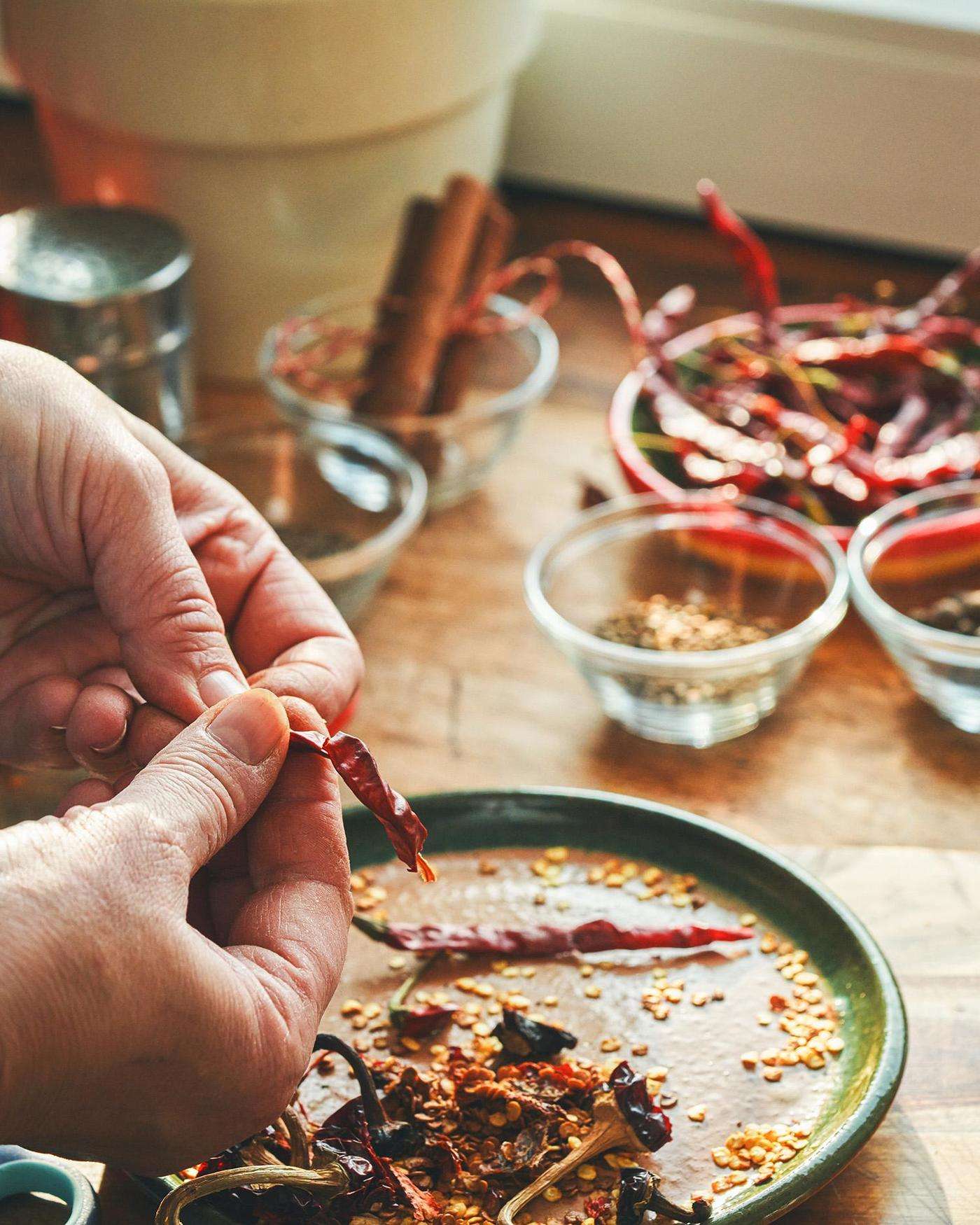 A person cutting peppers