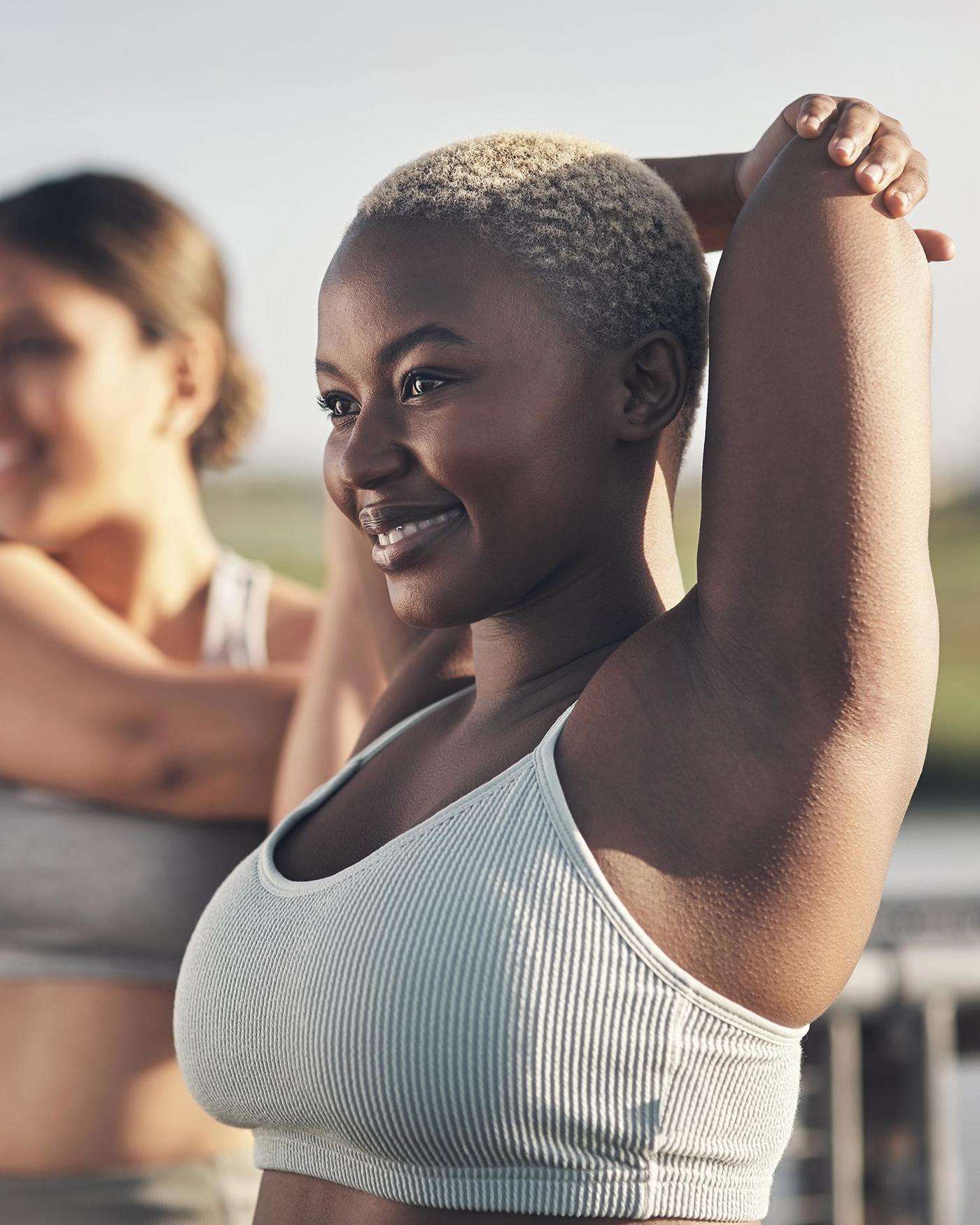 two women stretching