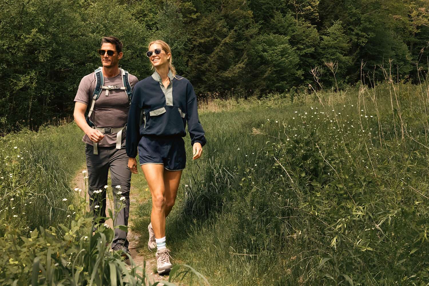 Woman and Man Walking in the Outdoors
