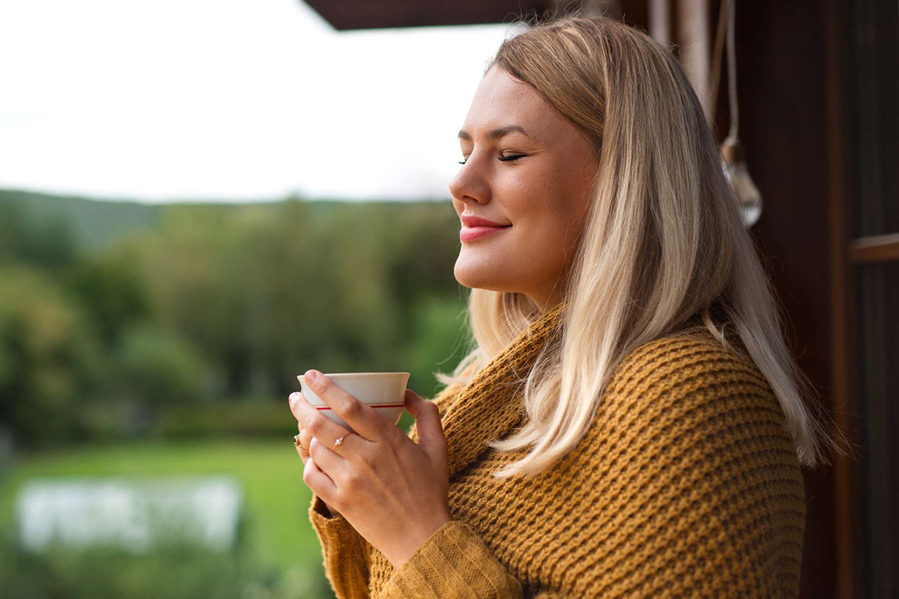 a woman drinking coffee