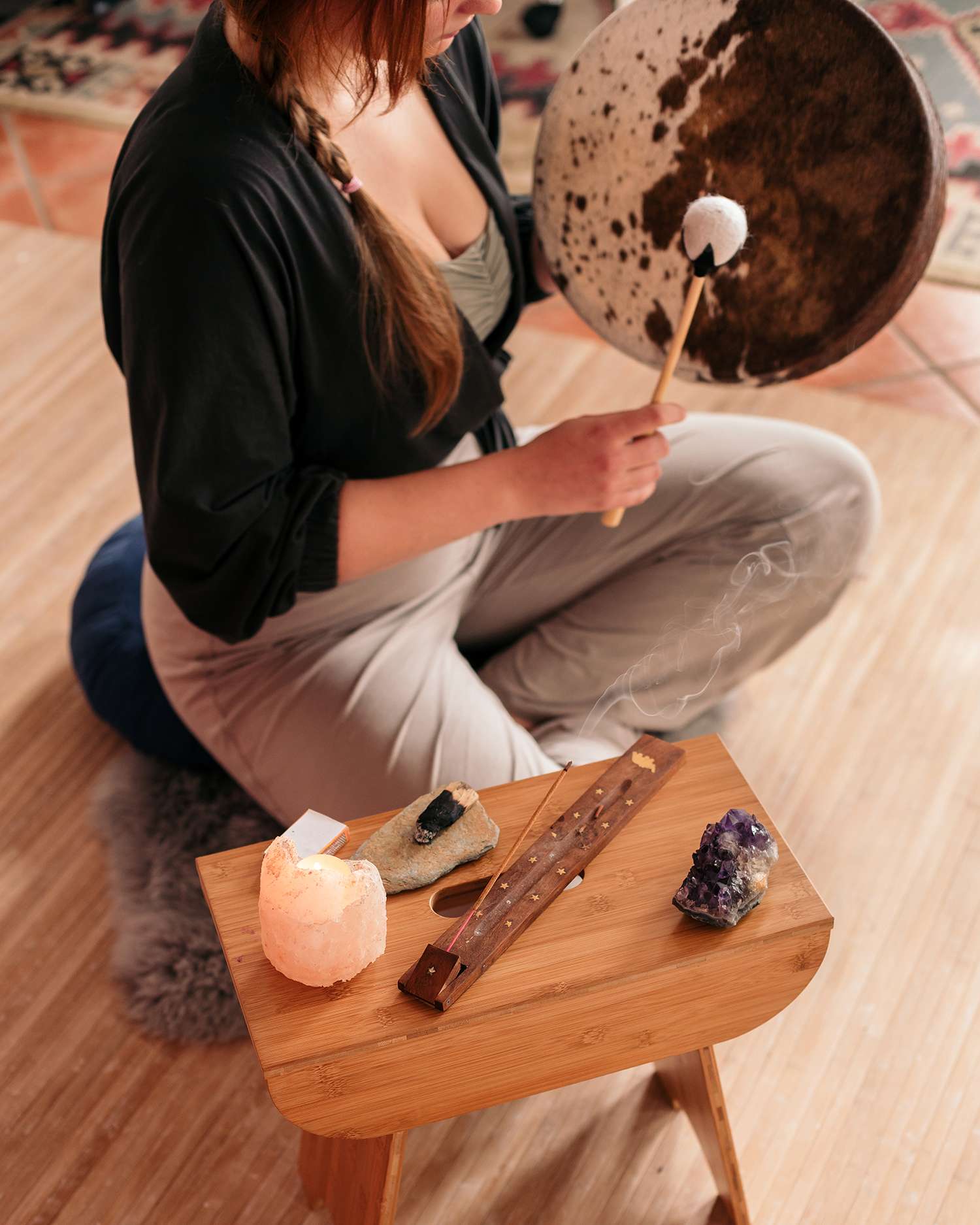 a woman ringing a gong