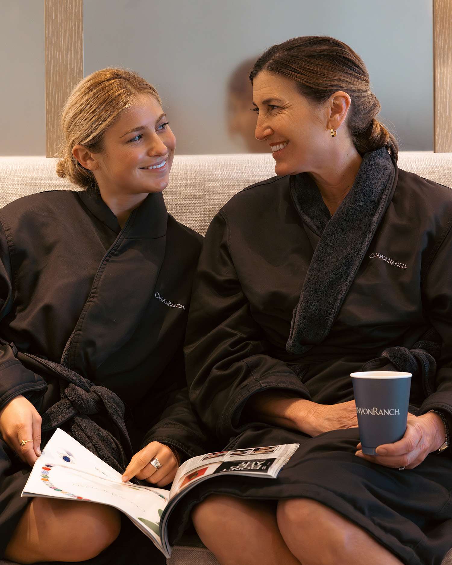 A woman and her daughter in the pool