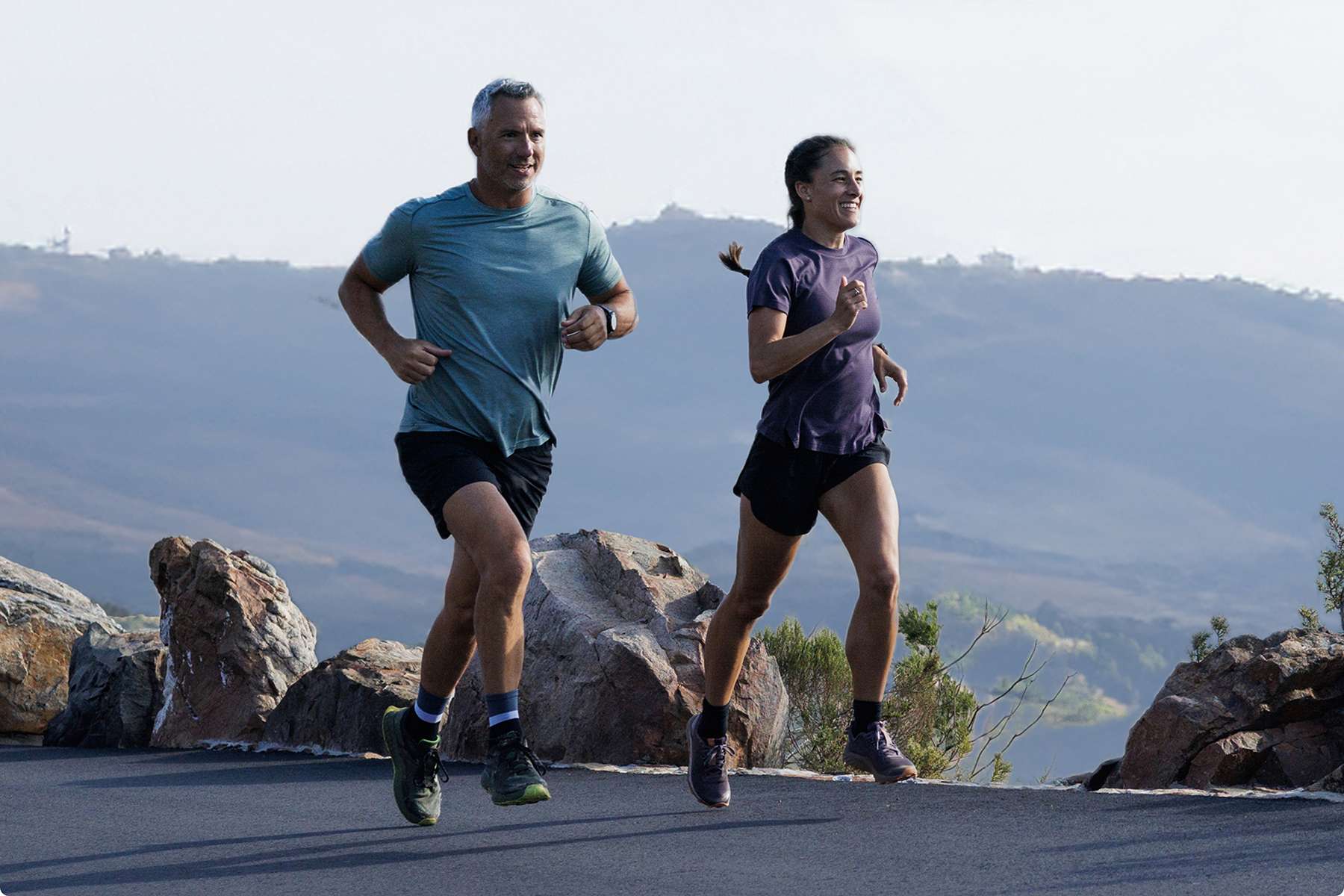 a fit older couple running