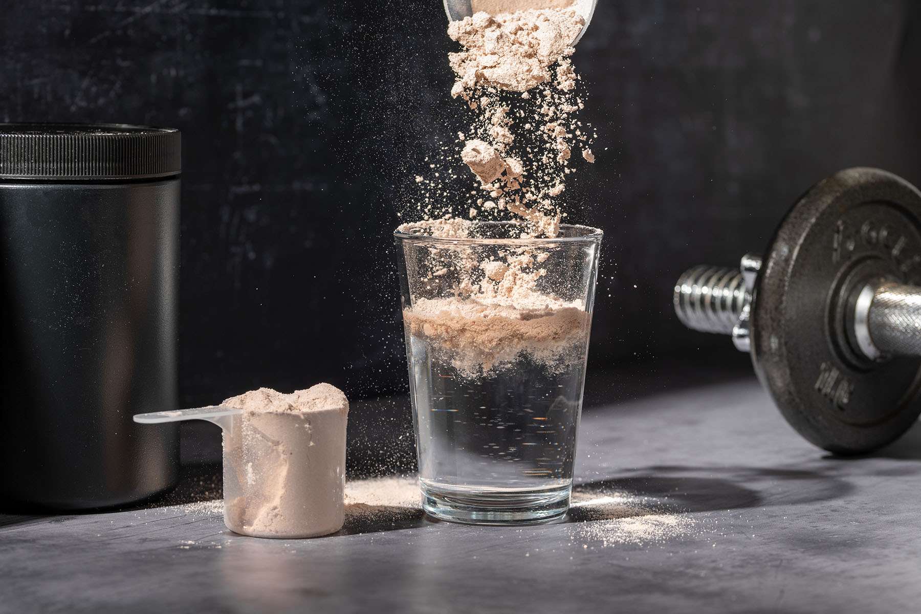 someone making a protein shake