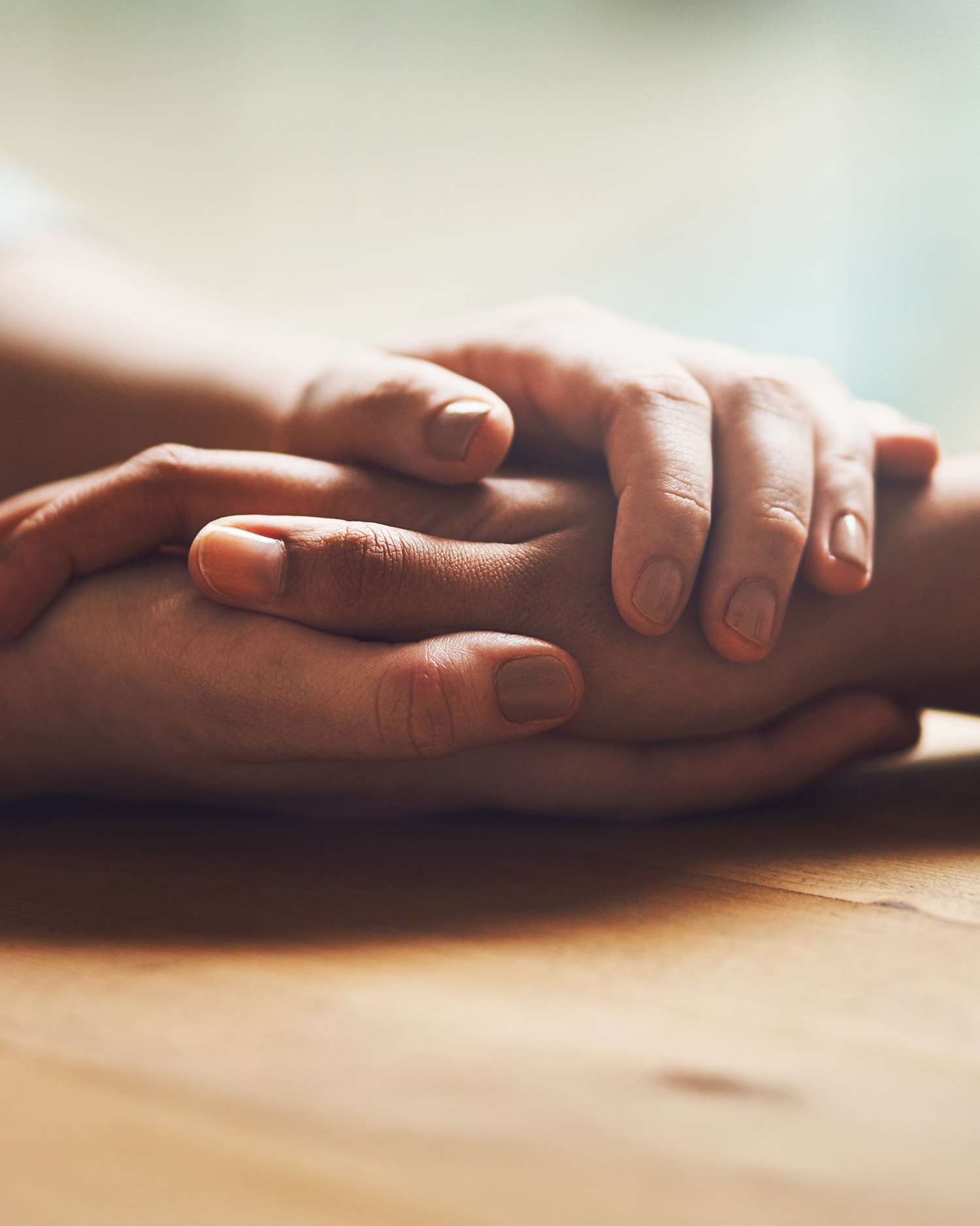 two people holding hands