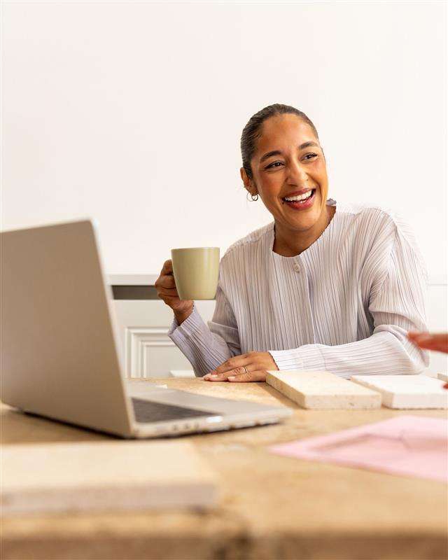 a woman drinking coffee