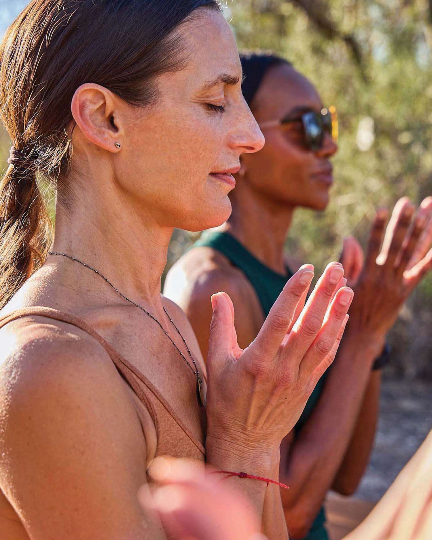 a group of women meditating