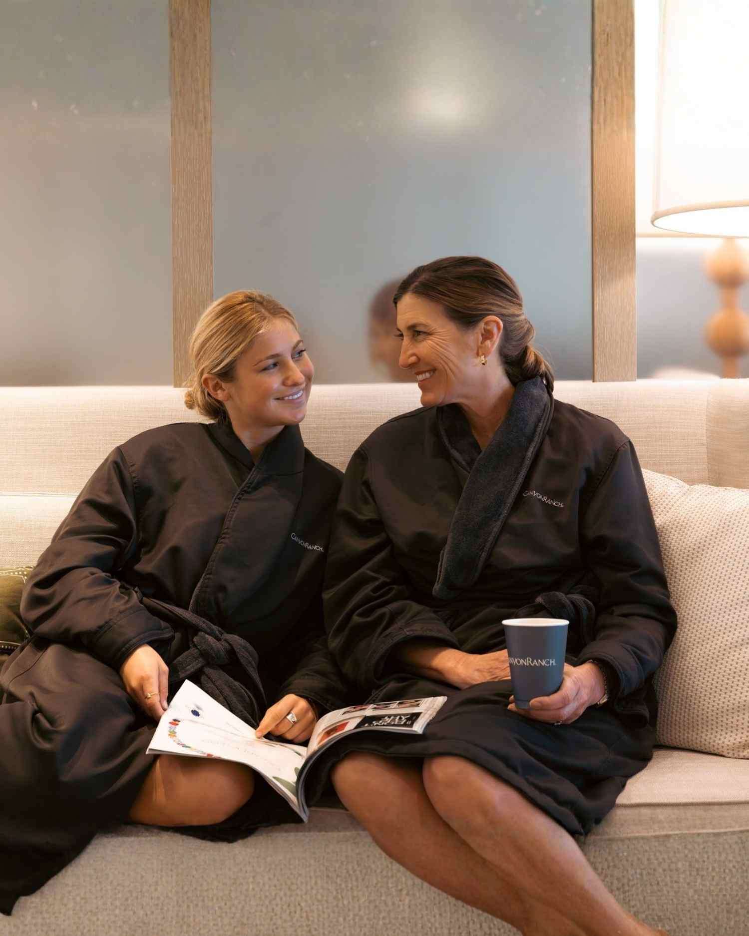 A woman and her daughter in the pool