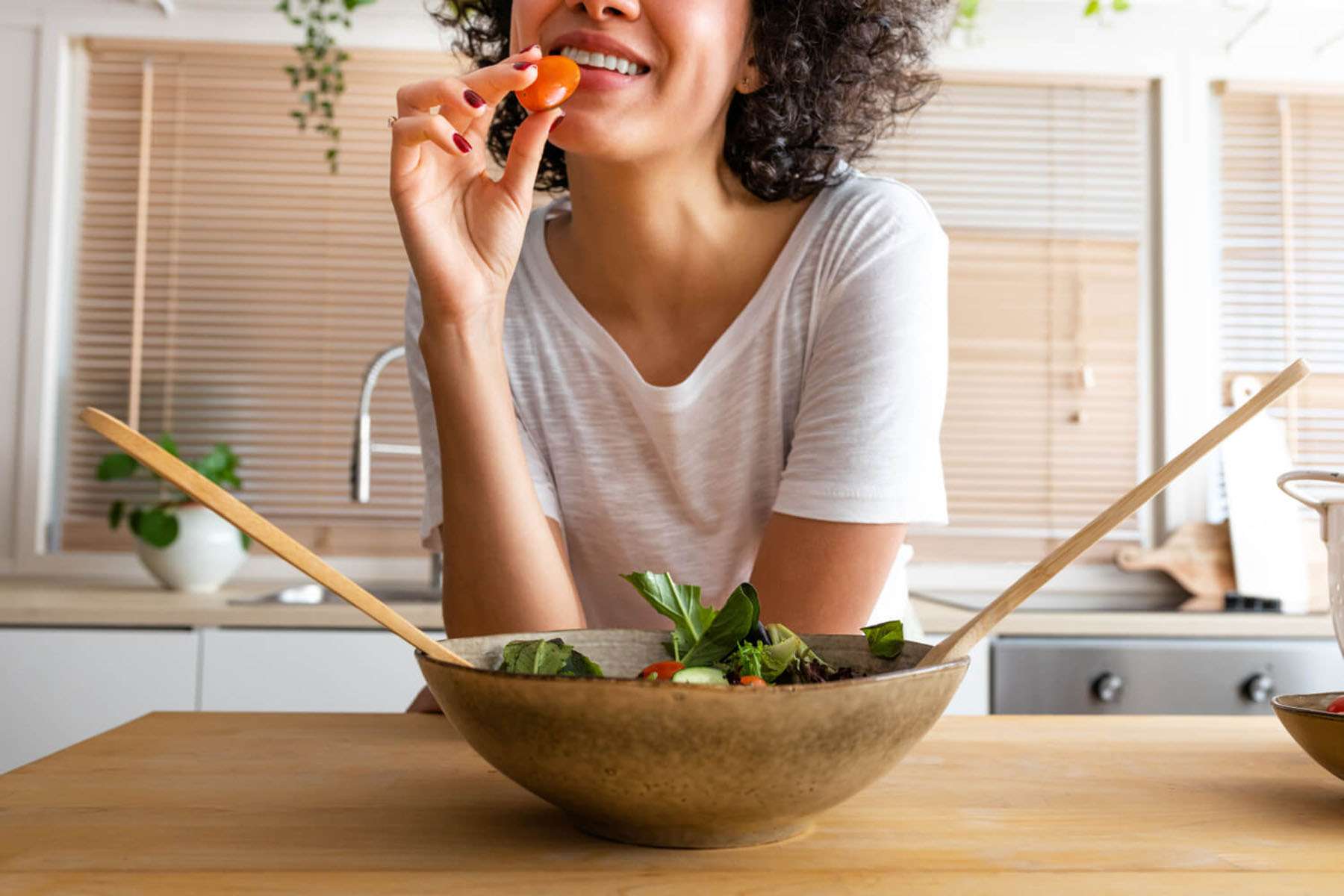 a woman eating healthy food