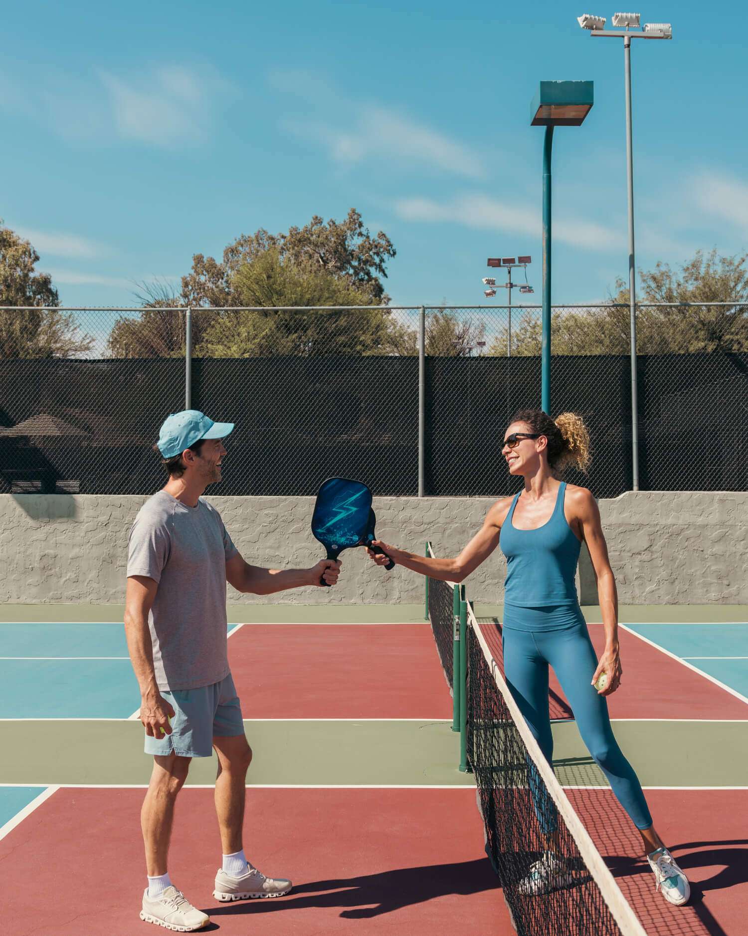 a group playing pickleball