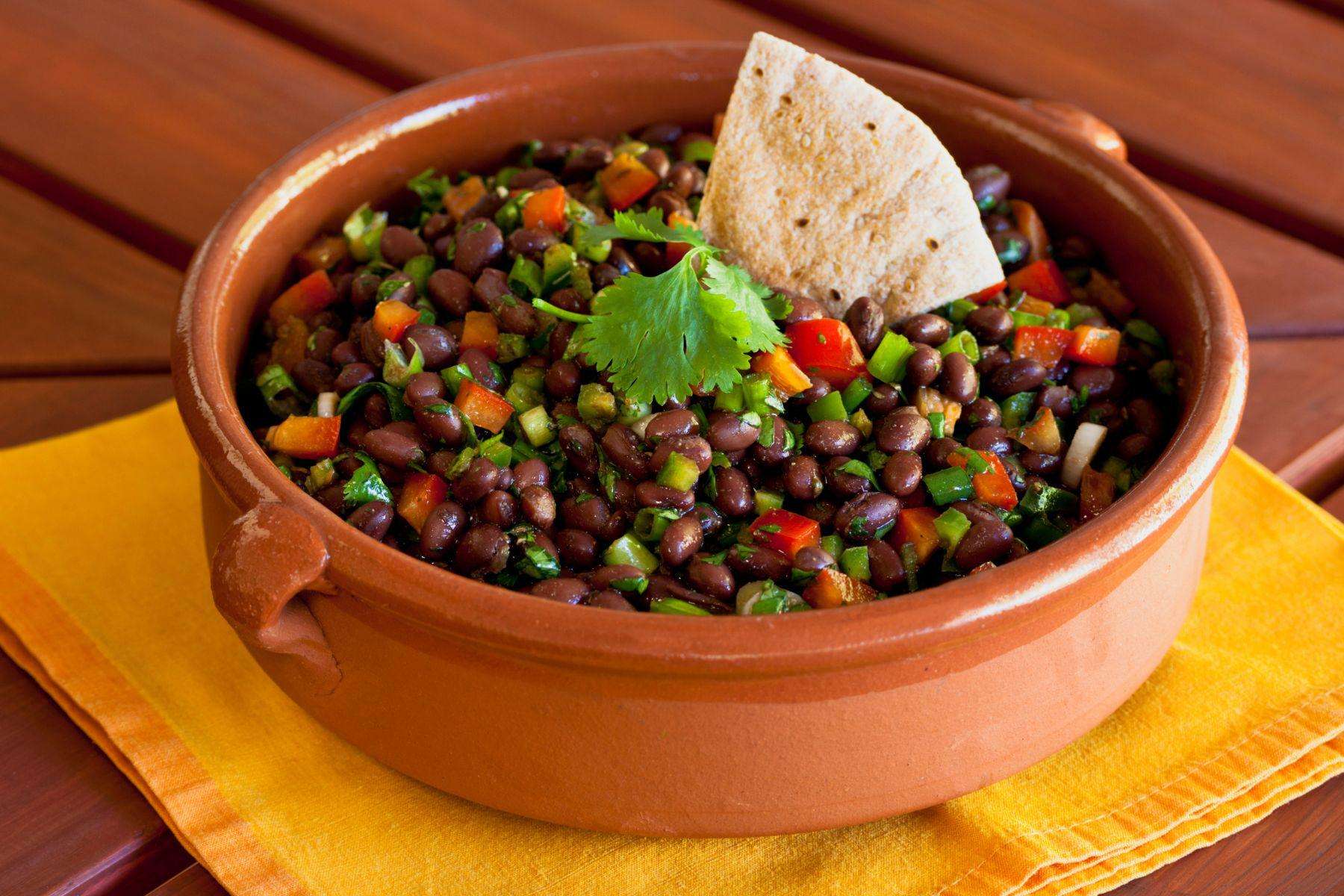 Canyon Ranch Black Bean Stuffing in wooden bowl.