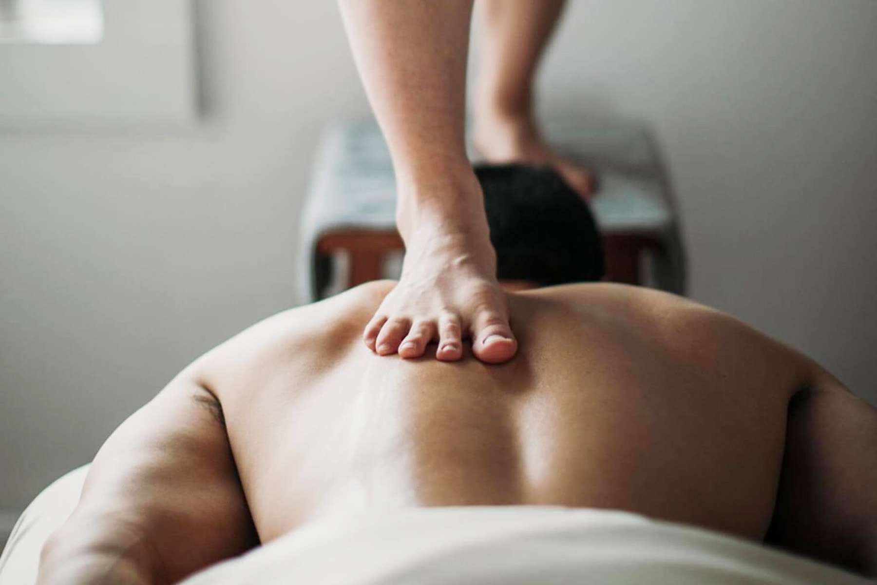 a person getting a Ashiatsu Massage
