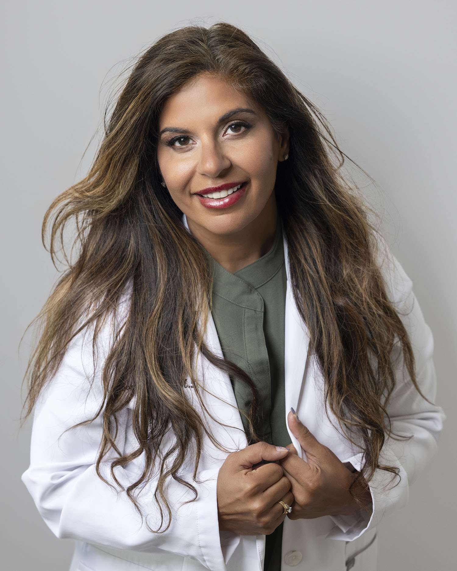 a woman floating in water with an overlay image of Dr. Somi