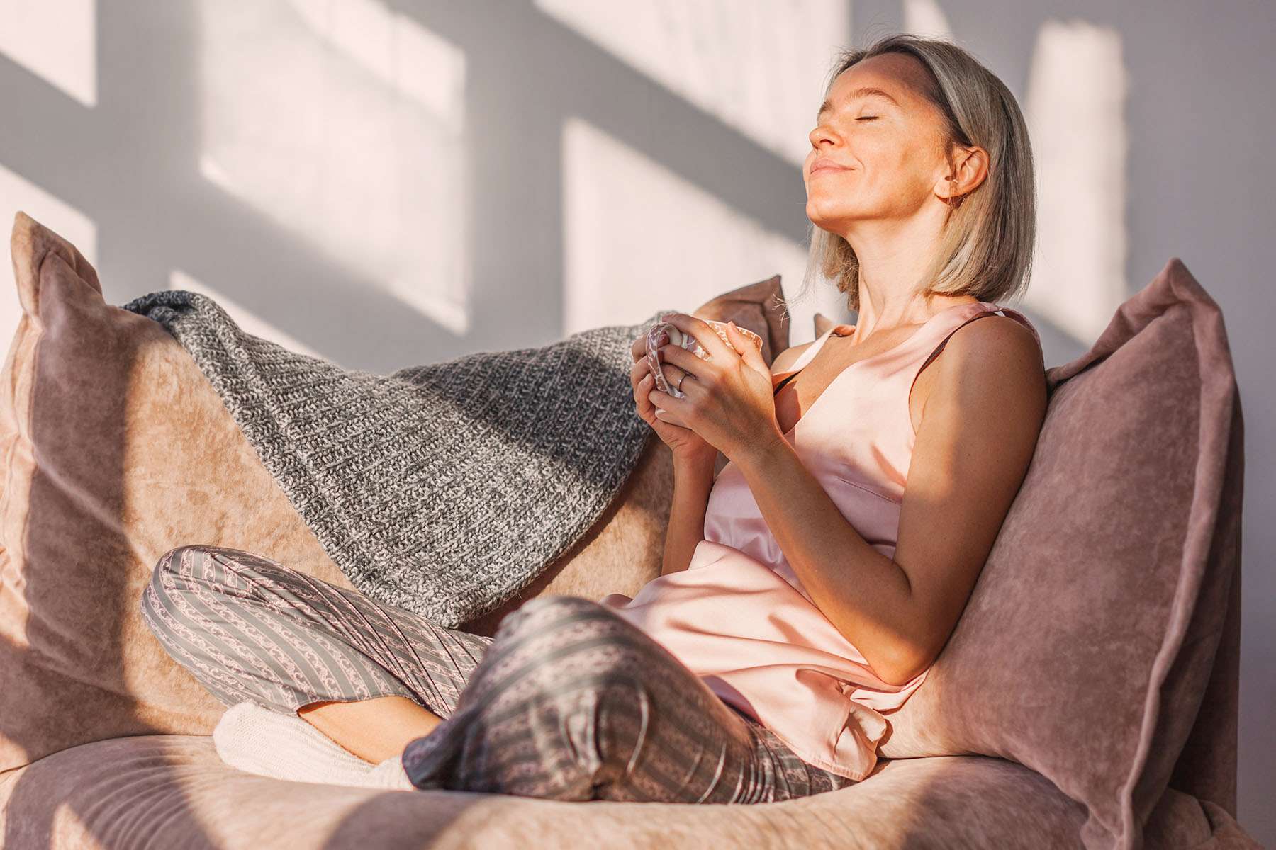 a woman sitting on a couch