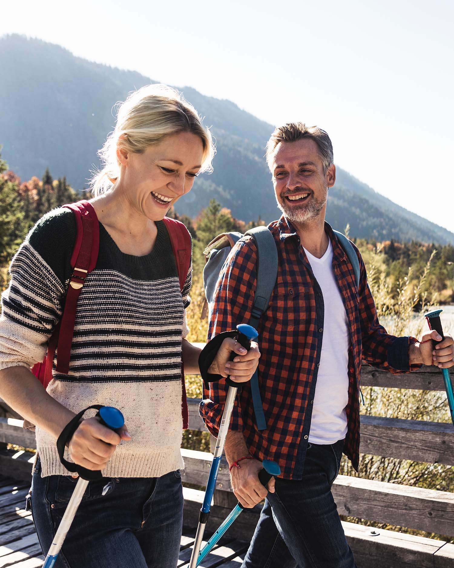 Man and Woman Hiking in the Mountains 