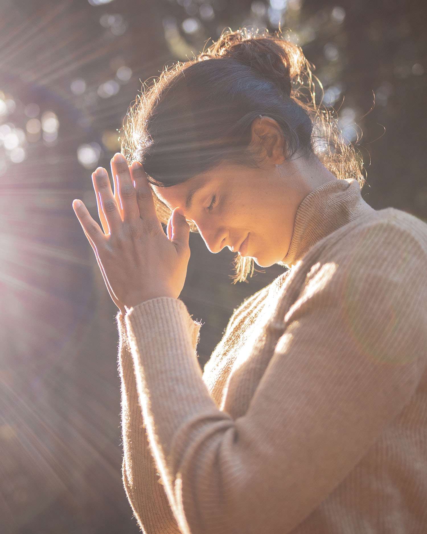 Woman Meditating in the Forrest 
