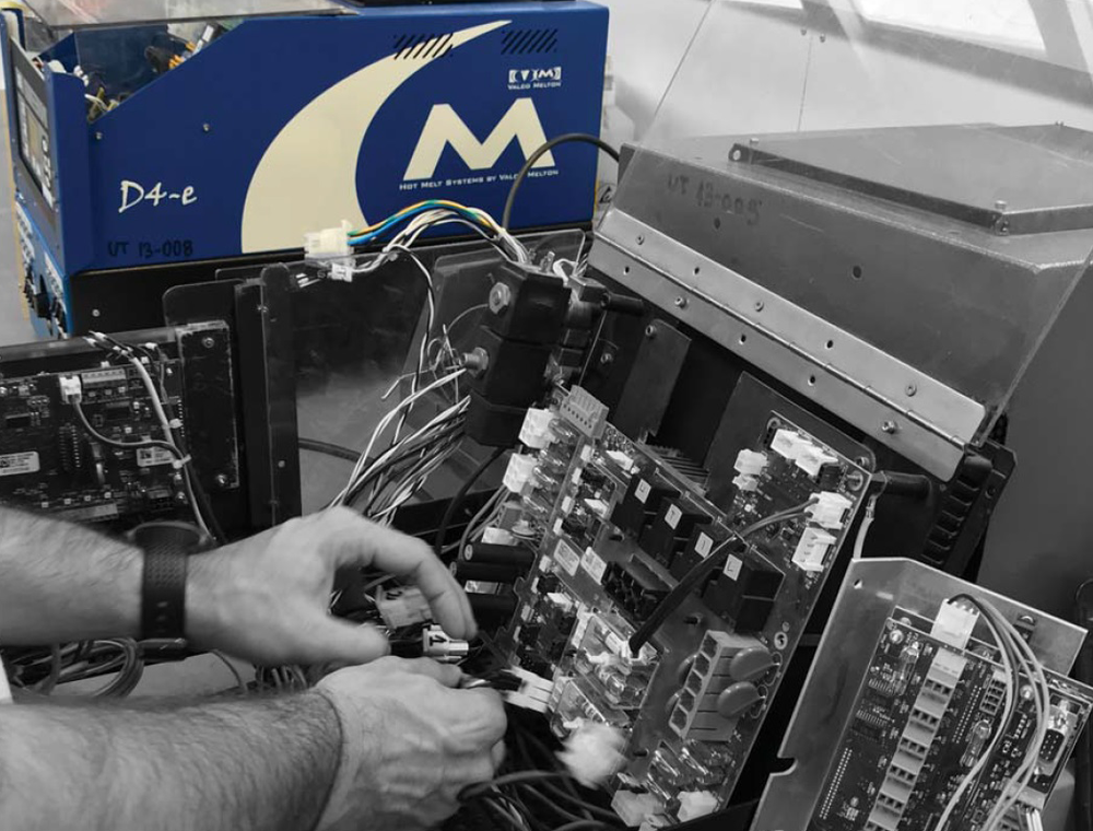 The Hidden Costs of Hot Melt System Downtime: Maintenance Strategies That Pay Off