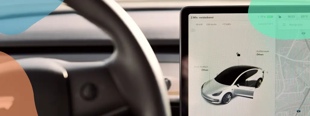 A steering wheel and a look an on on-board computer