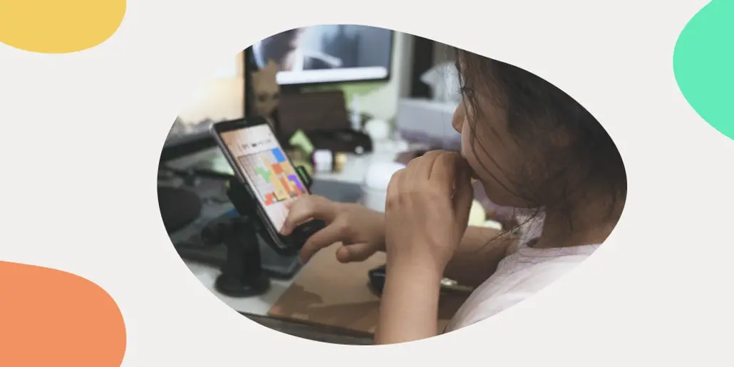 A child playing on the phone