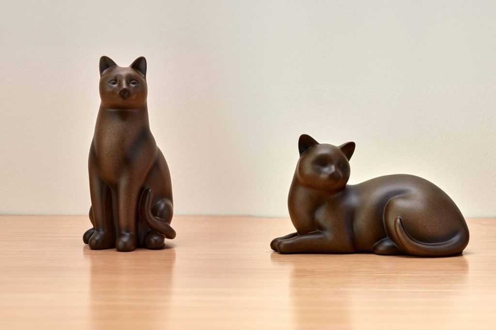 beautiful colored or brass urns specifically for a cat