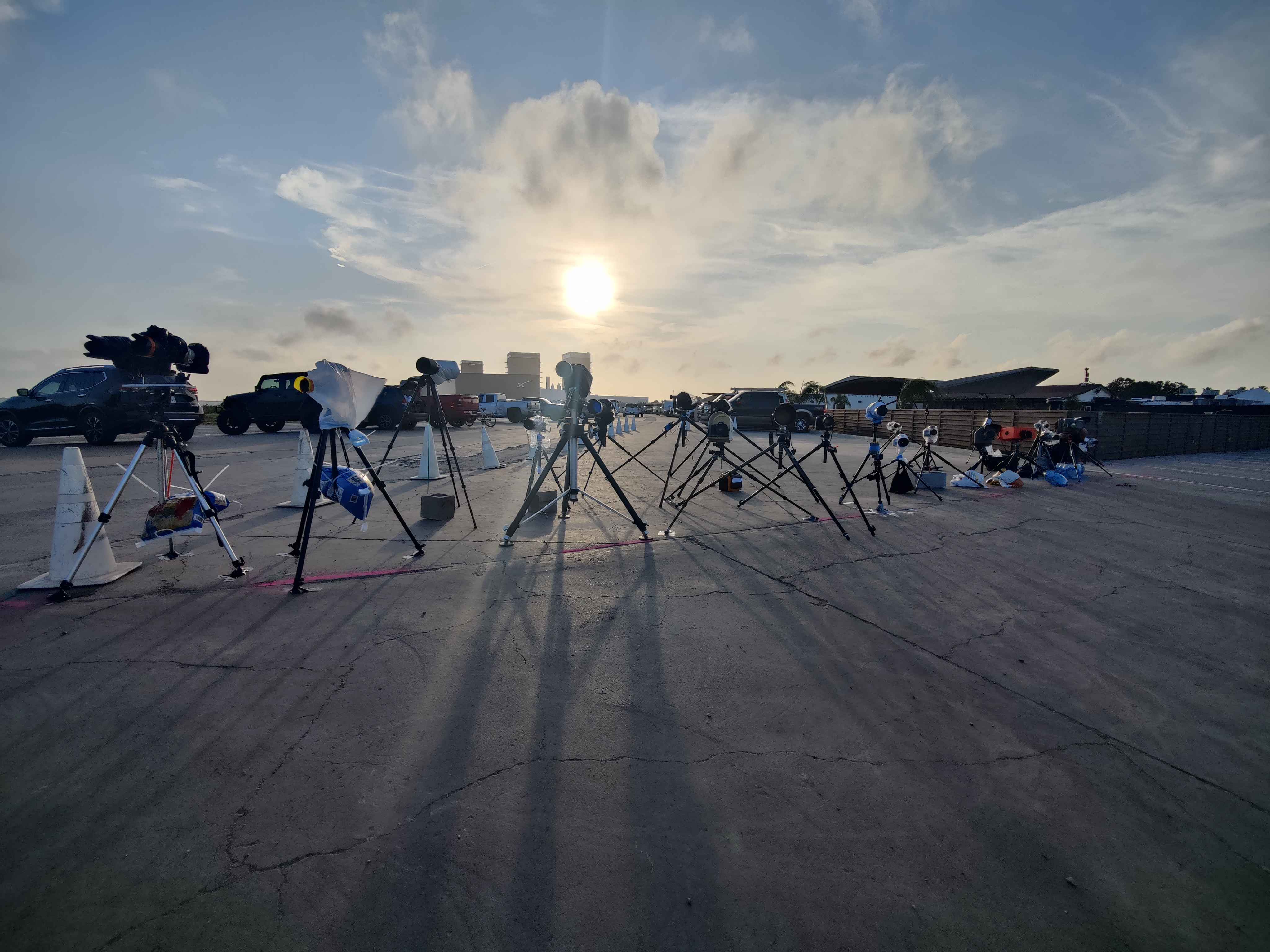 Lineup of remote cameras awaits the Starship 6 launch, capturing every moment of this historic event. Among them is Richard P. Gallagher's own setup, each meticulously placed and tuned to document the fiery ascent. A tribute to the dedication of aerospace photographers.